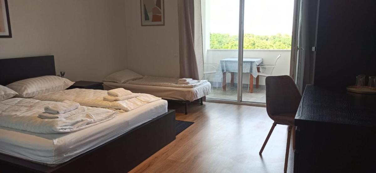 Deluxe Room - Photo 10