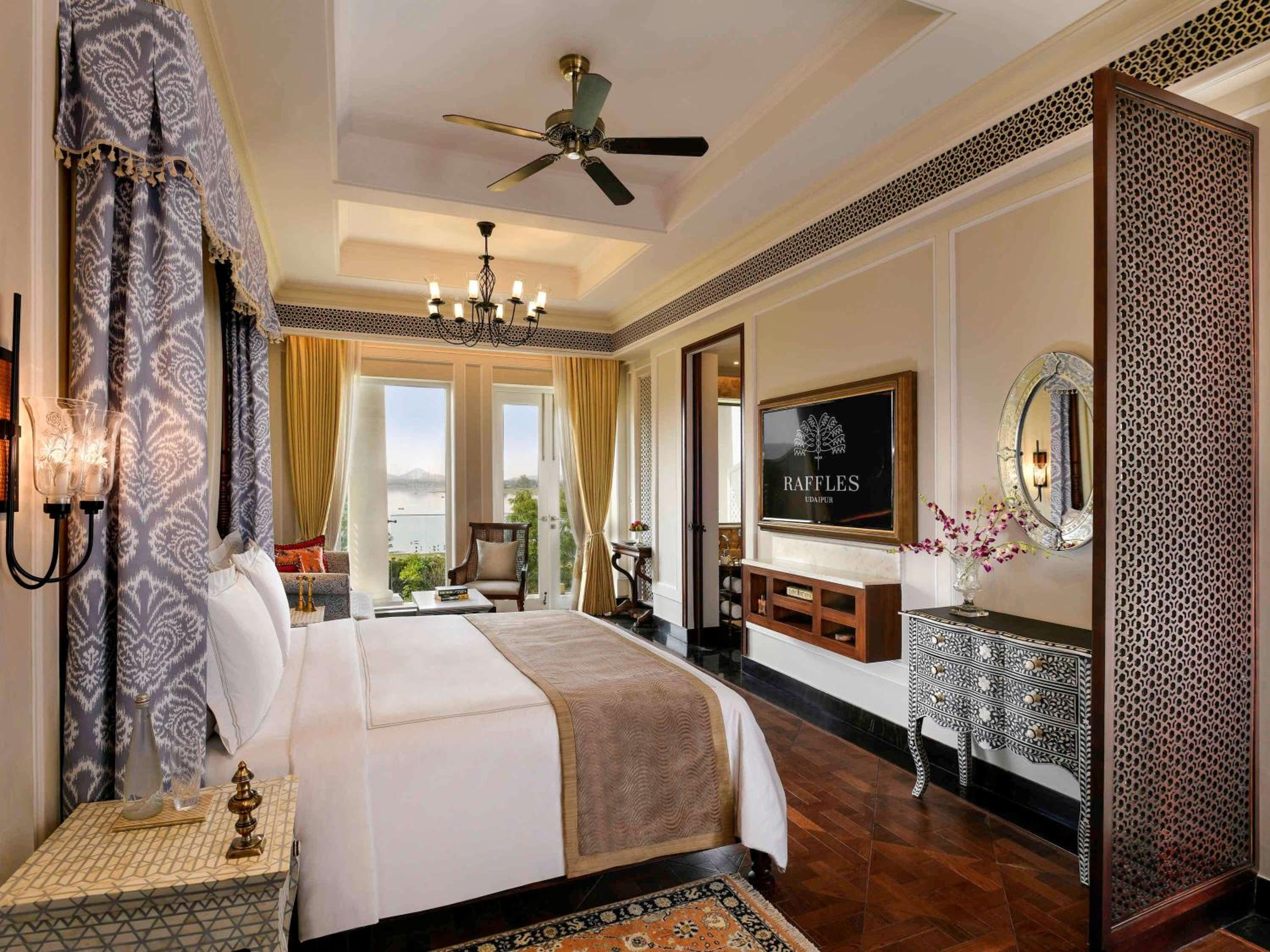 Flamingo Signature King Room with Balcony:15% off on F&B, Spa | soulful yoga experience| Morning & Evening Aarti | traditional & nature led experiences daily tea,curated walks,bird watching, Prana Garden, Rajasthani folk dance, Pottery, Mehendi, Astrology