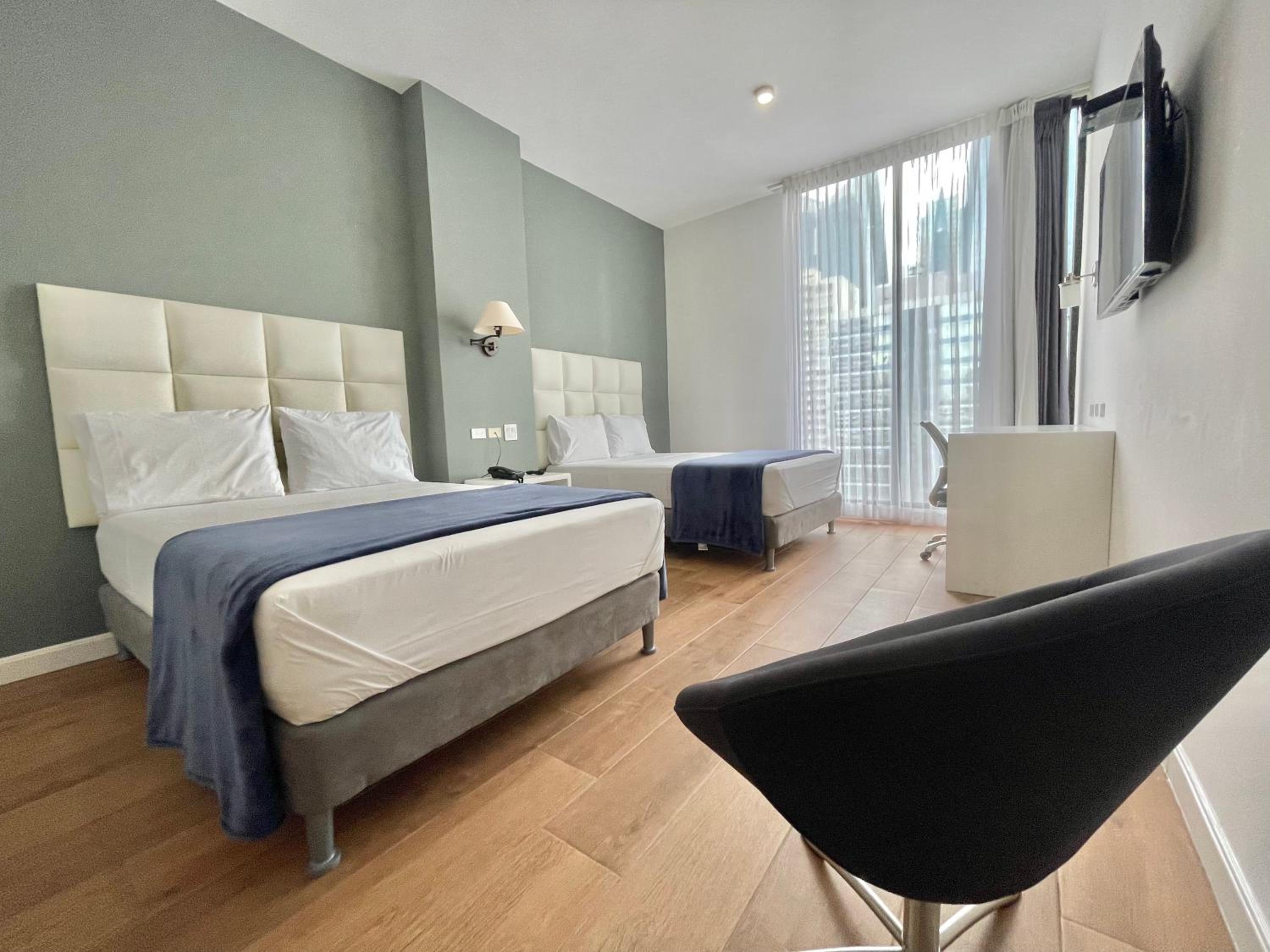 Deluxe Double Room – 2 Beds - Photo 10