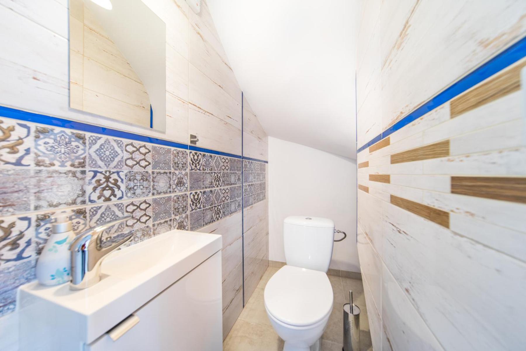 Four-Bedroom House - Photo 26