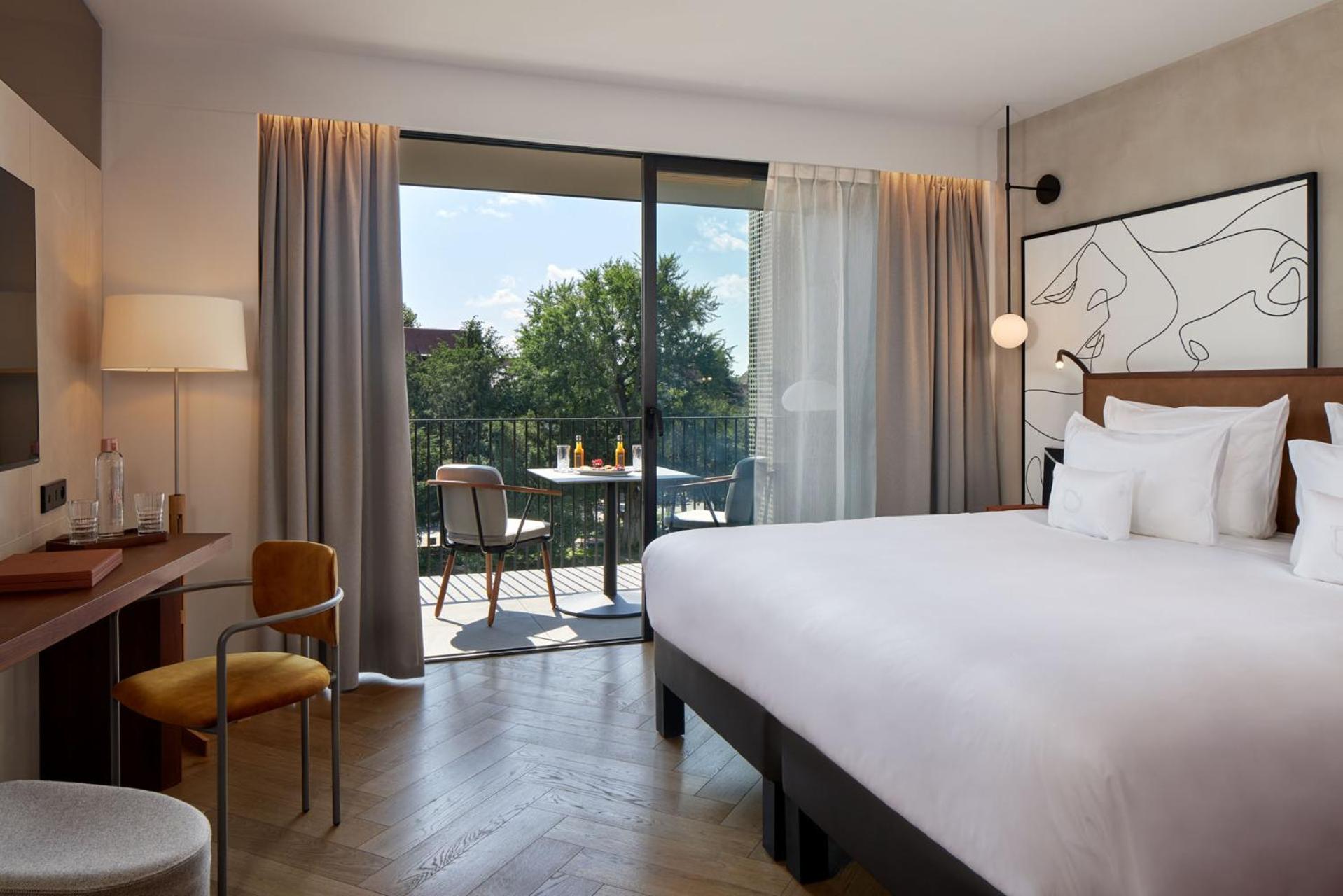 Deluxe King Room with Balcony - Photo 1
