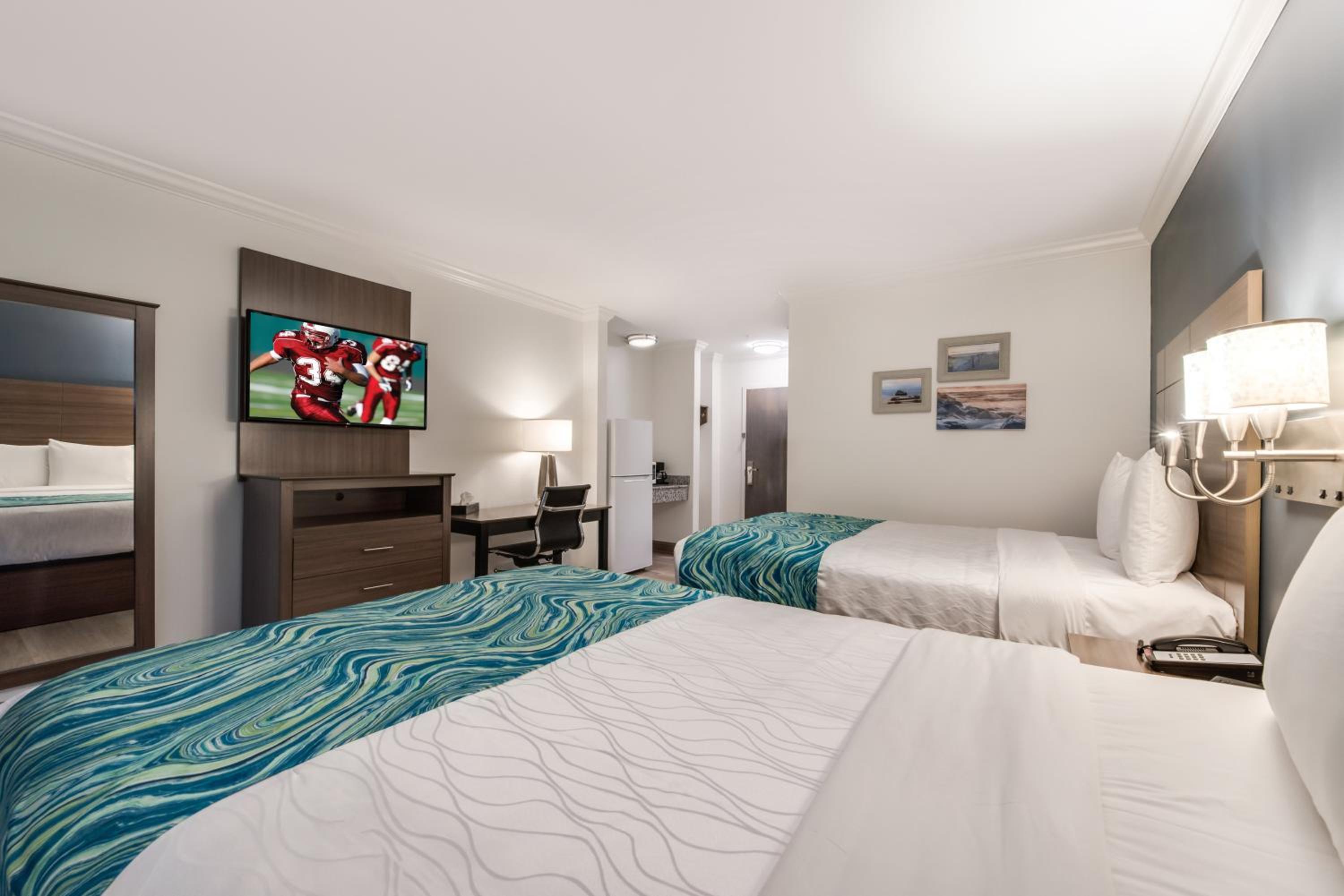 Deluxe Room with Two Double Beds with Balcony Smoke Free photo 1