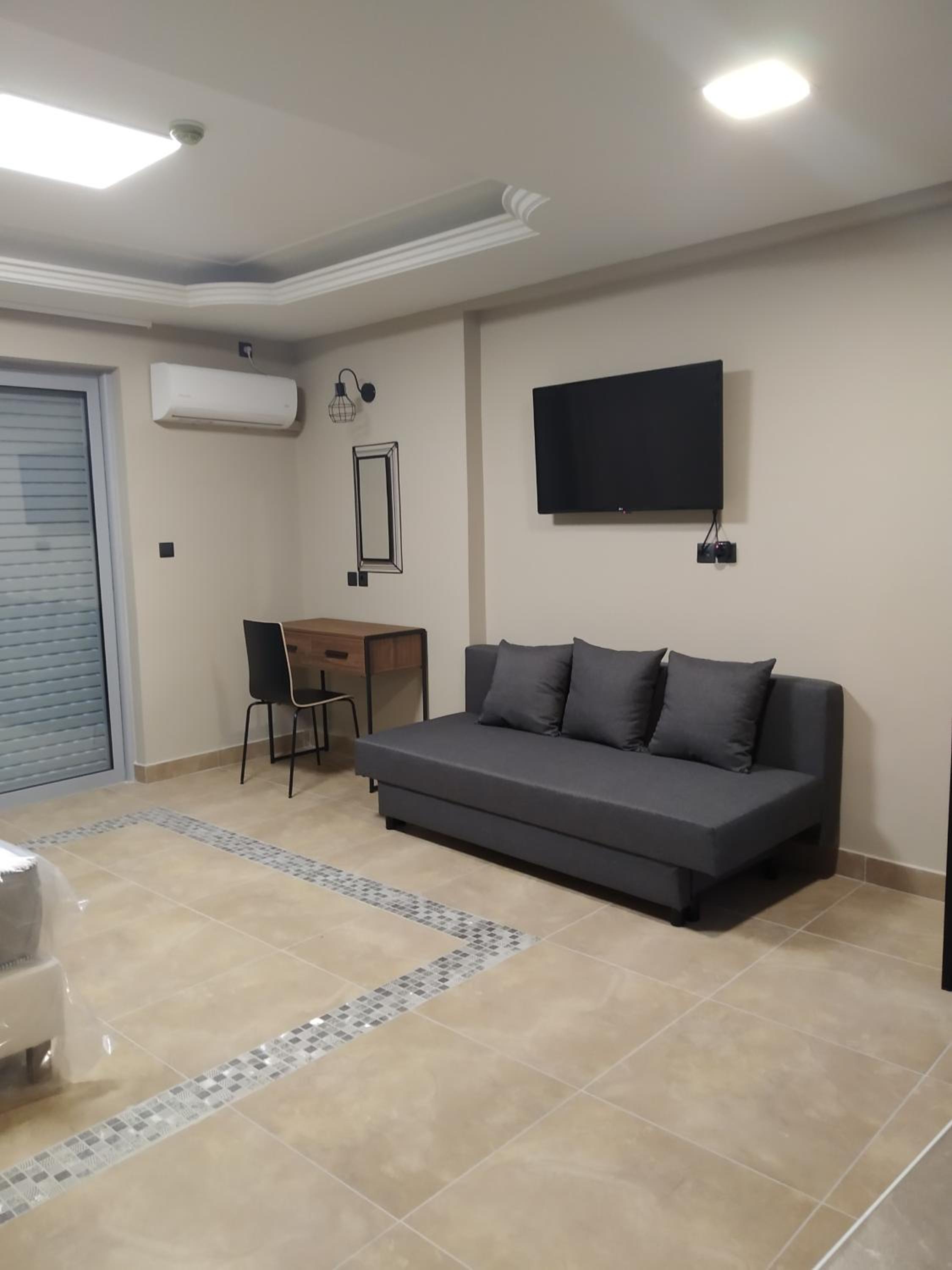 Family Room with Balcony - Photo 1