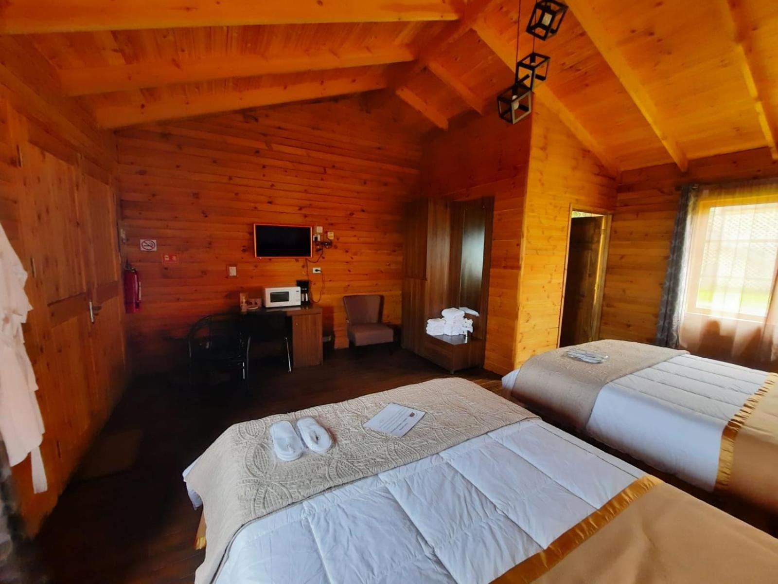 Deluxe Queen Room with Two Queen Beds photo 2