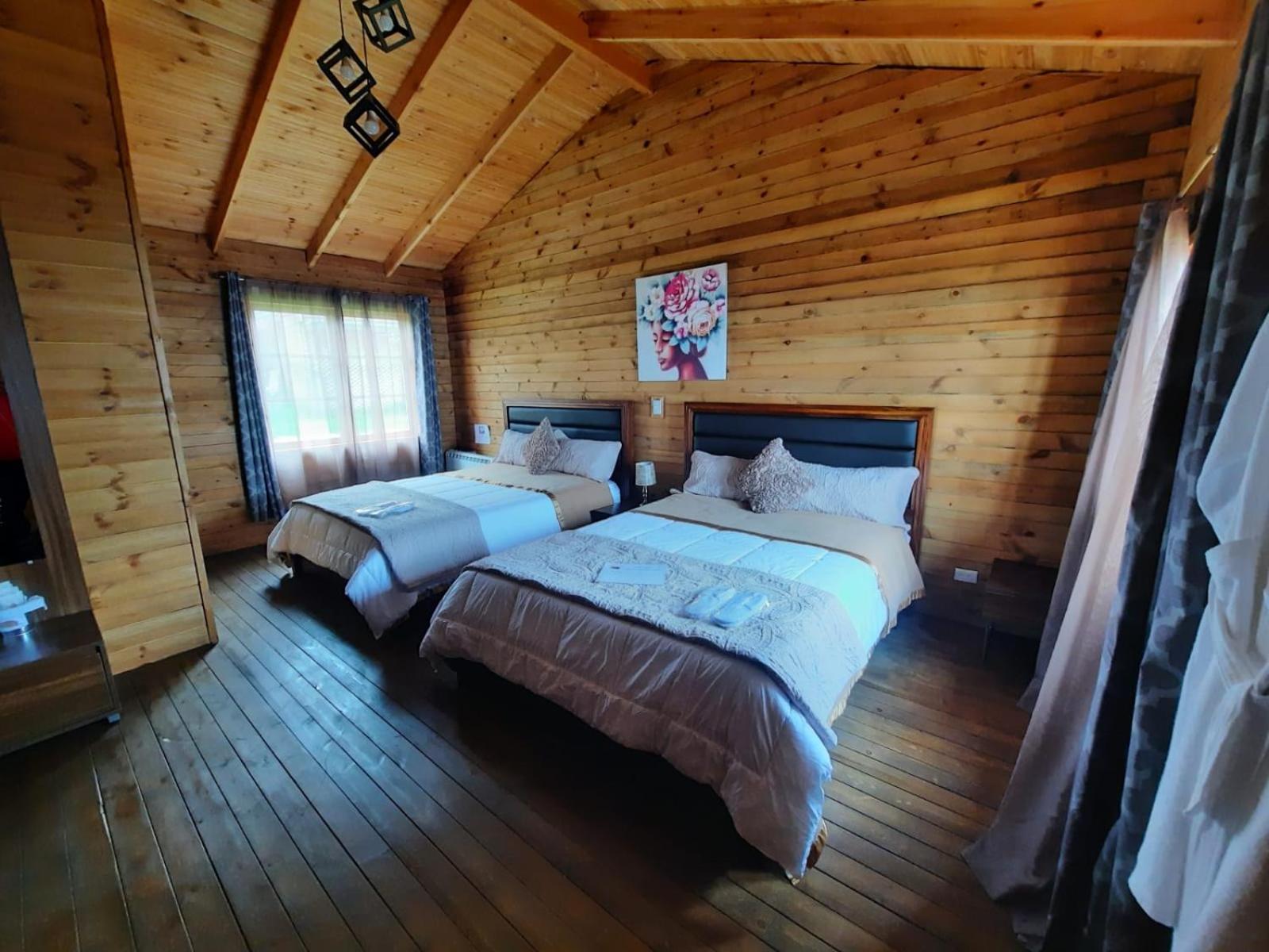 Deluxe Queen Room with Two Queen Beds photo 3