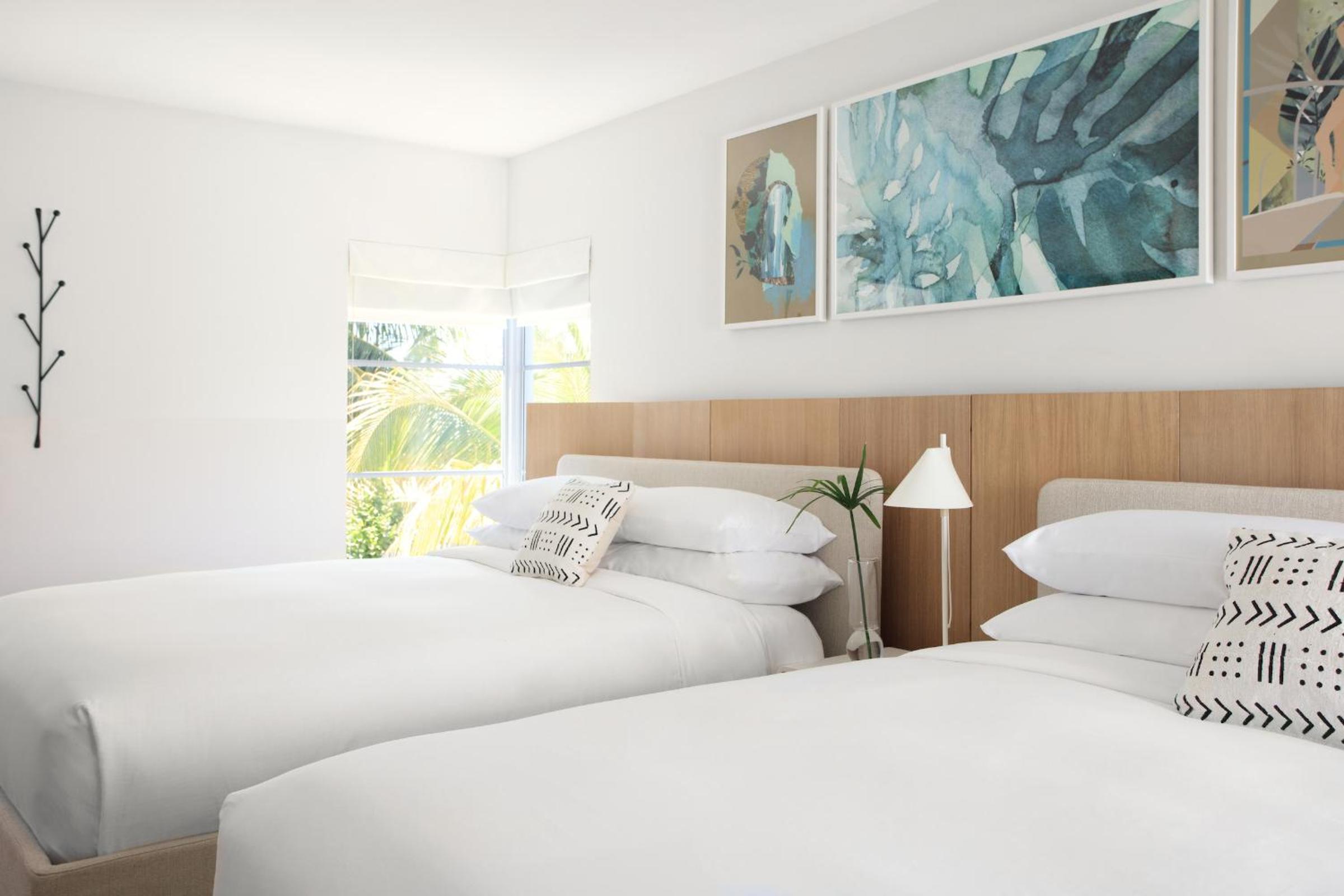 Queen Room with Two Queen Beds - Photo 1