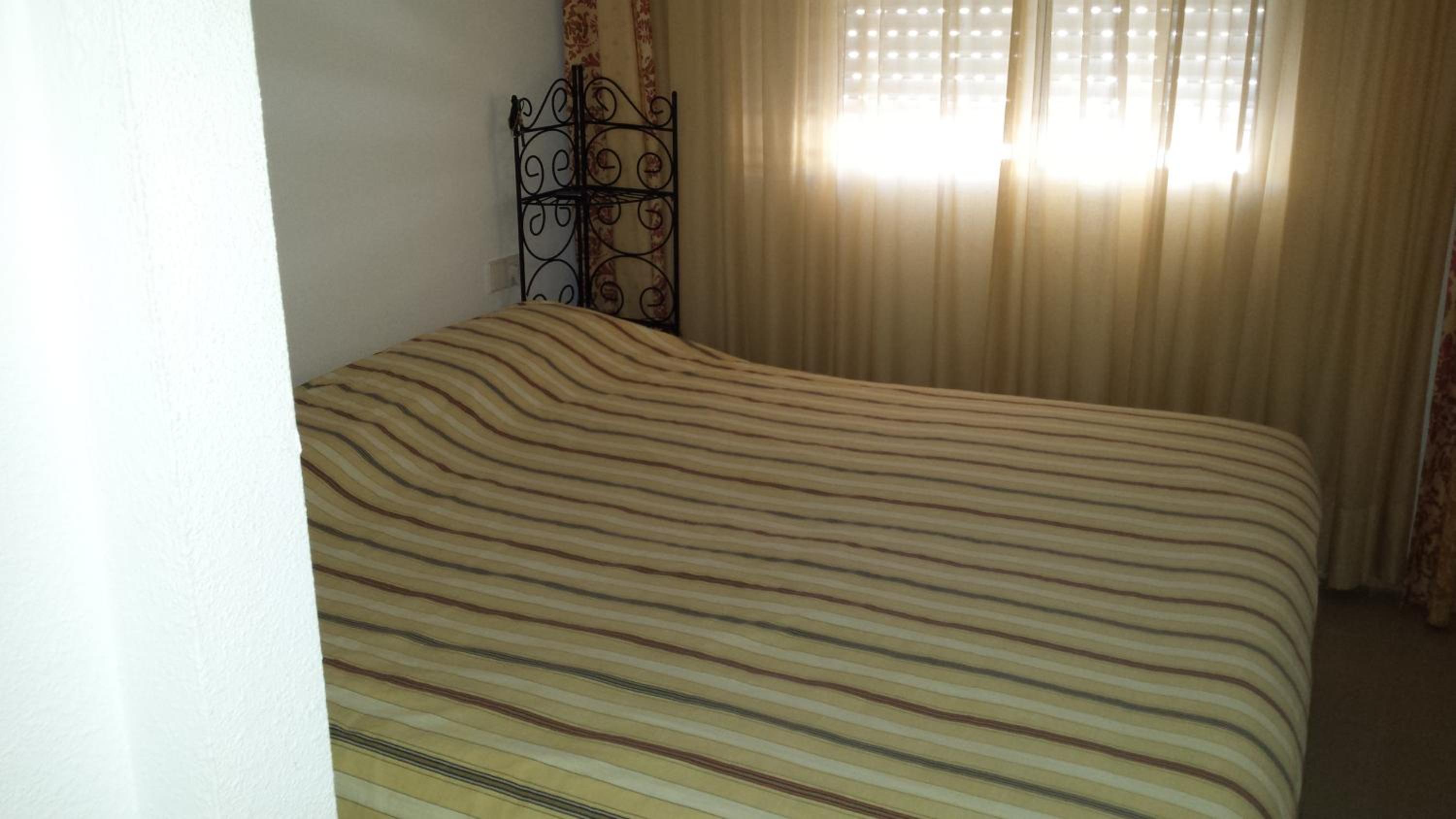 Three-Bedroom Apartment - Photo 9