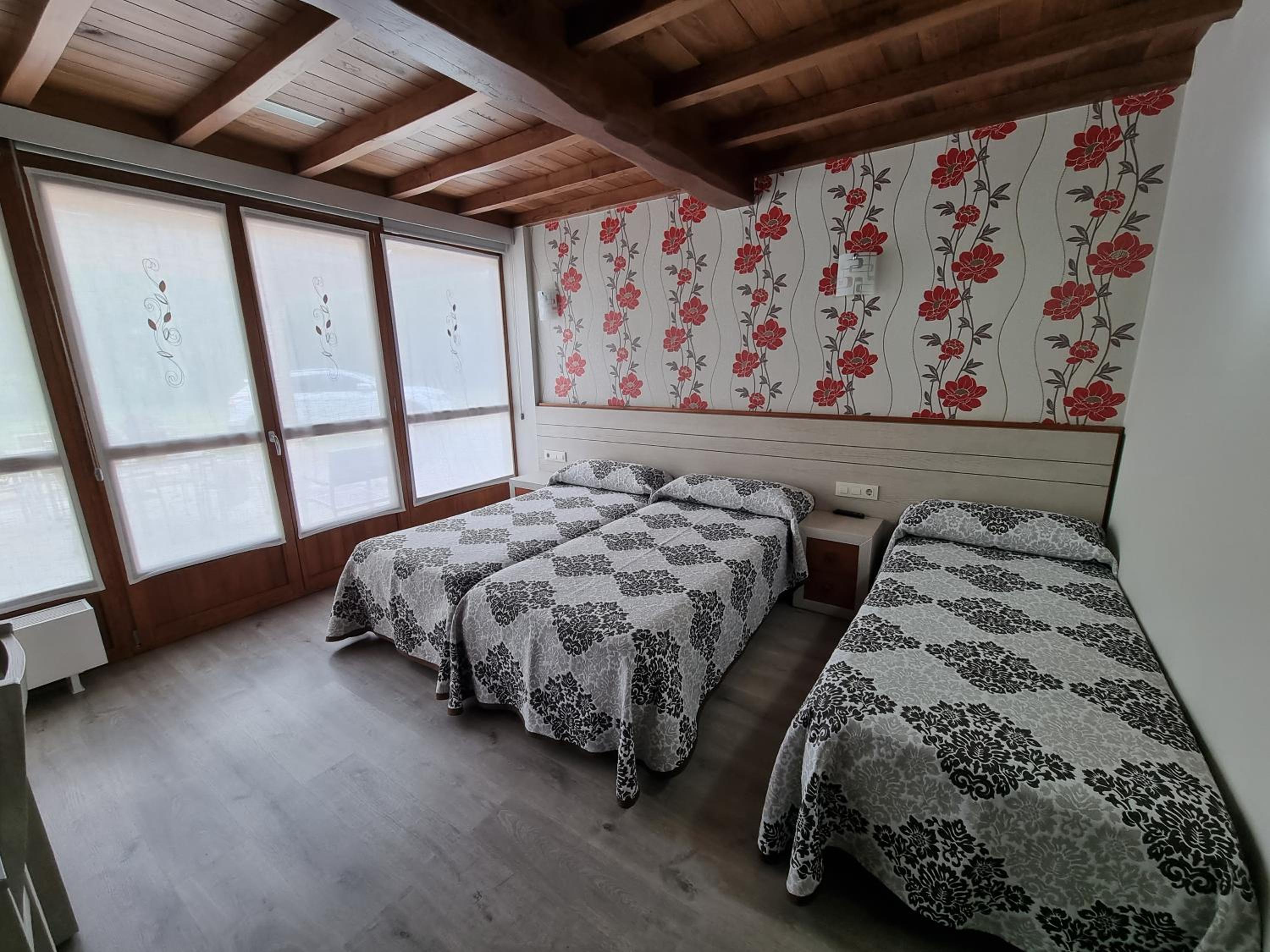 Habitación Triple con Baño Privado