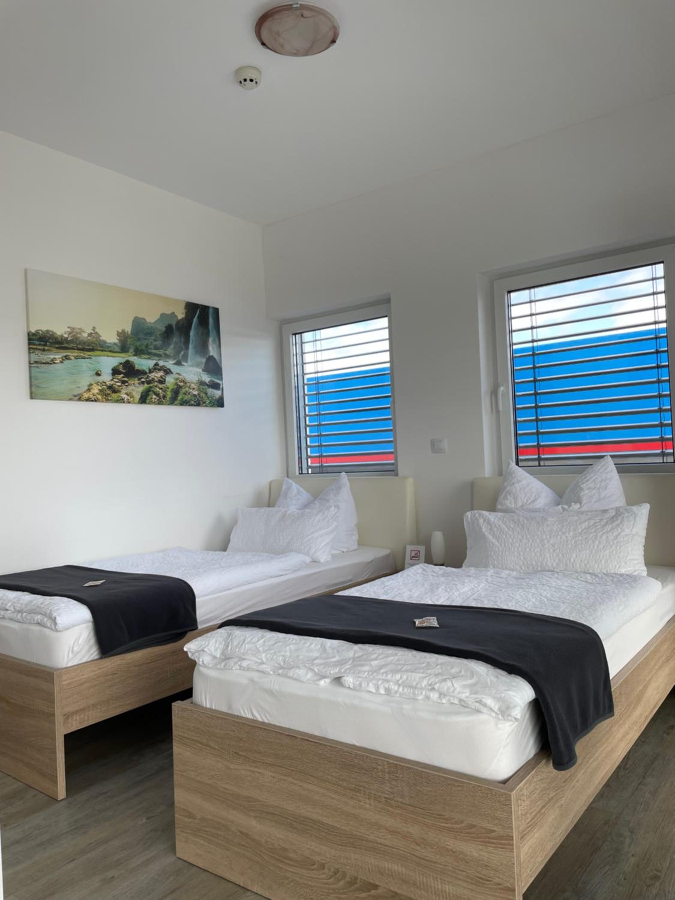 Twin Room with Private Bathroom - Photo 1