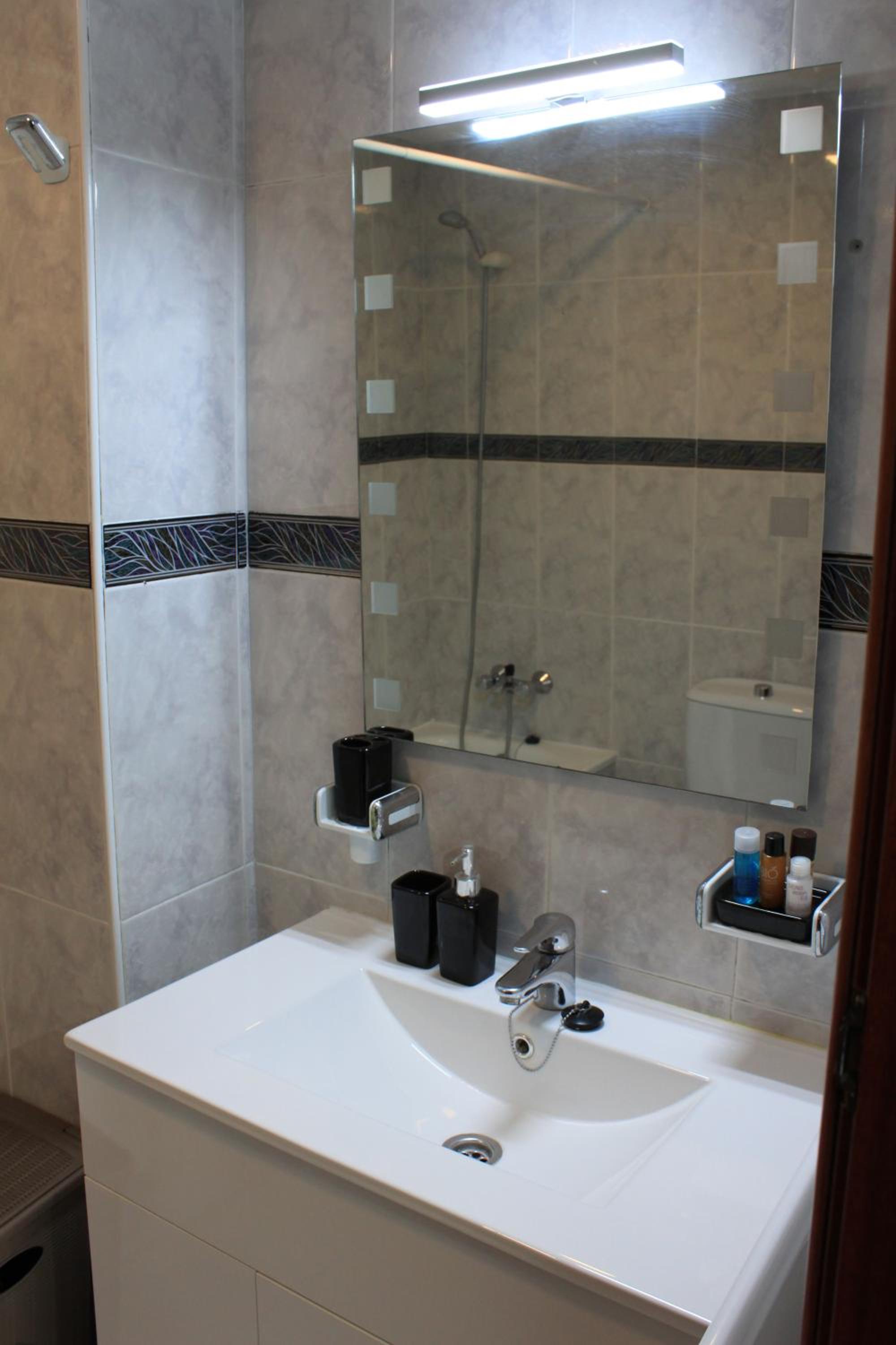 Two-Bedroom Apartment - Photo 21