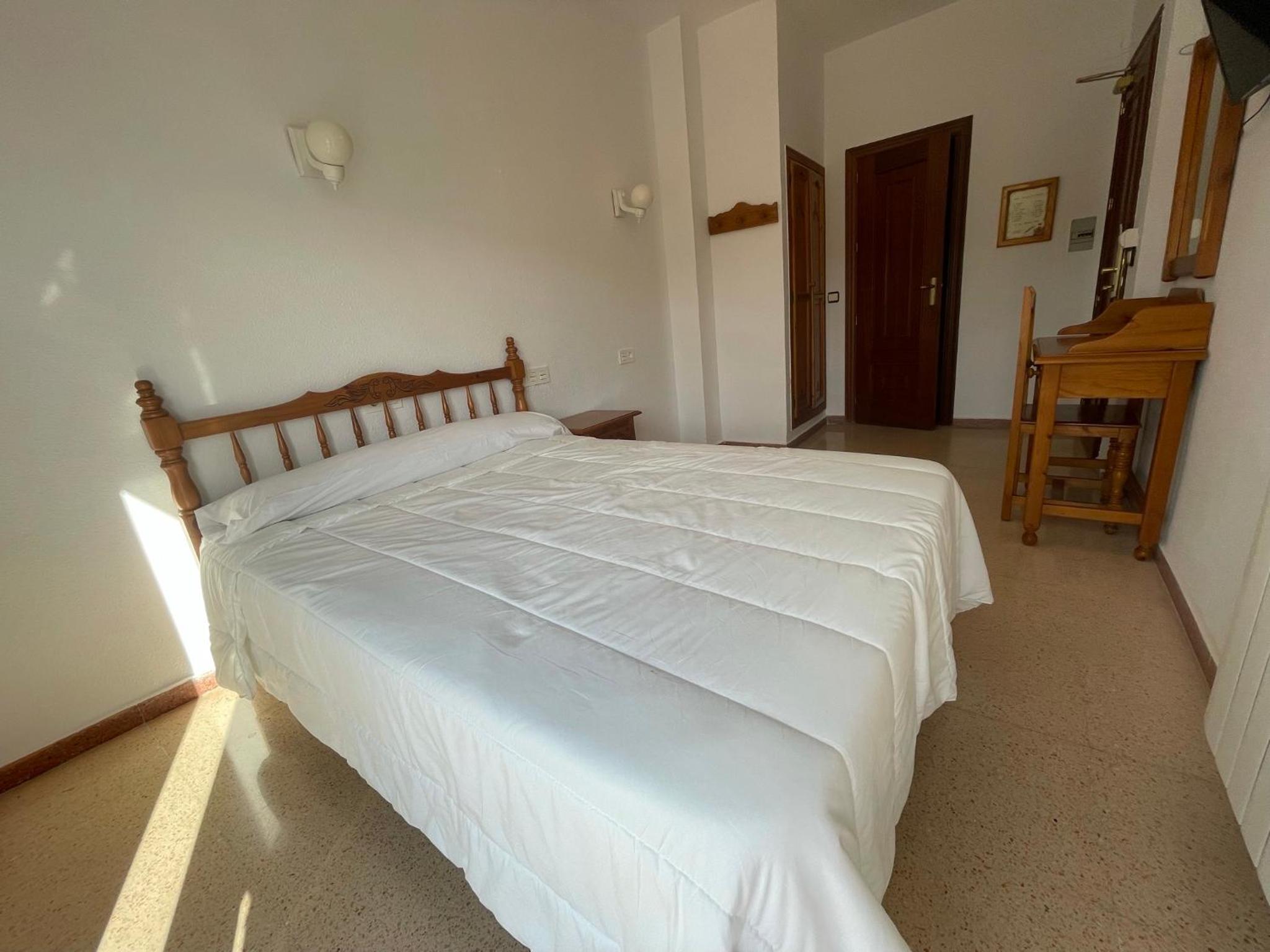 Habitación Estándar con Cama Queen