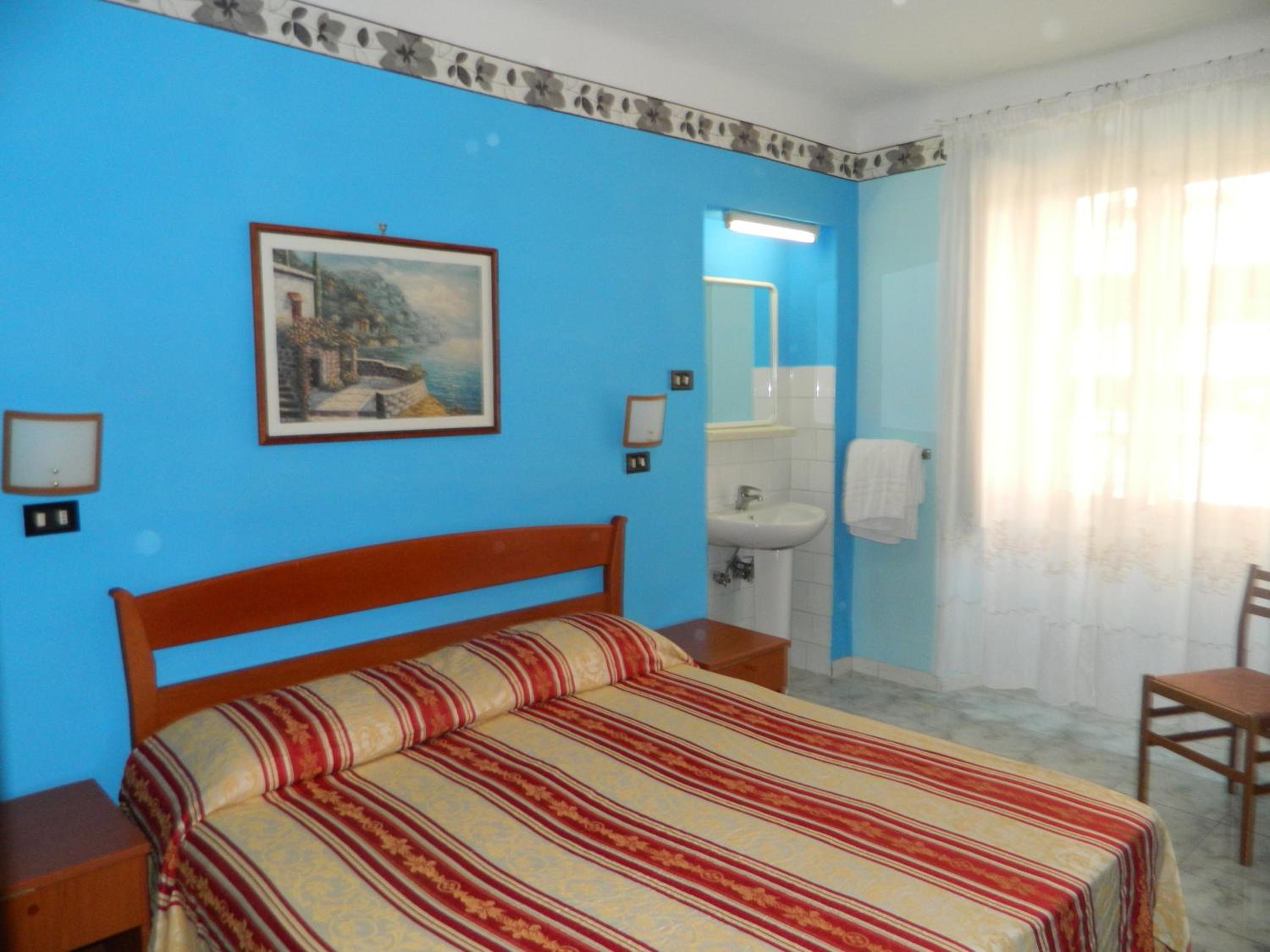 Standard Double Room with Shared Bathroom