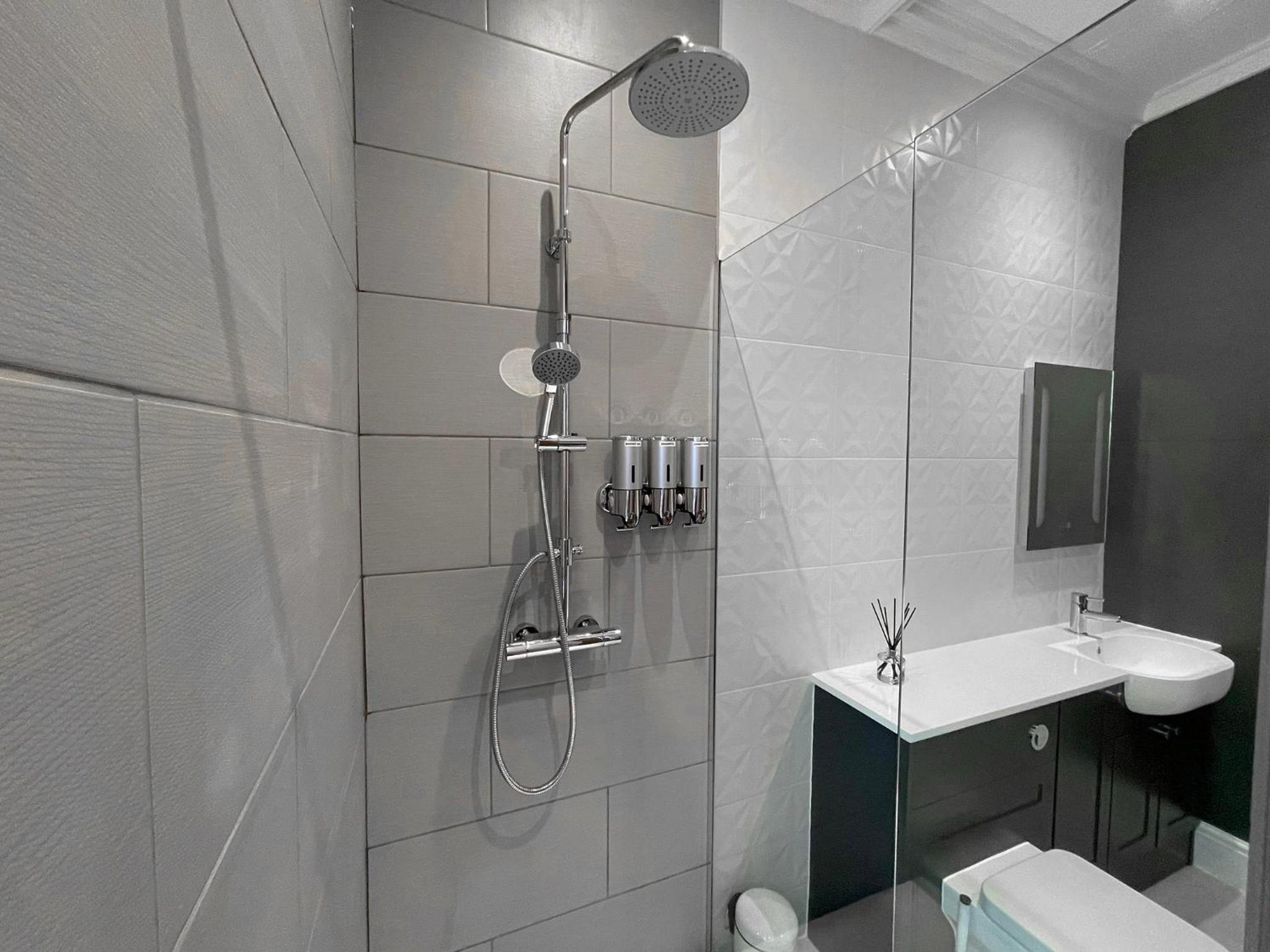 Three-Bedroom Apartment - Photo 16