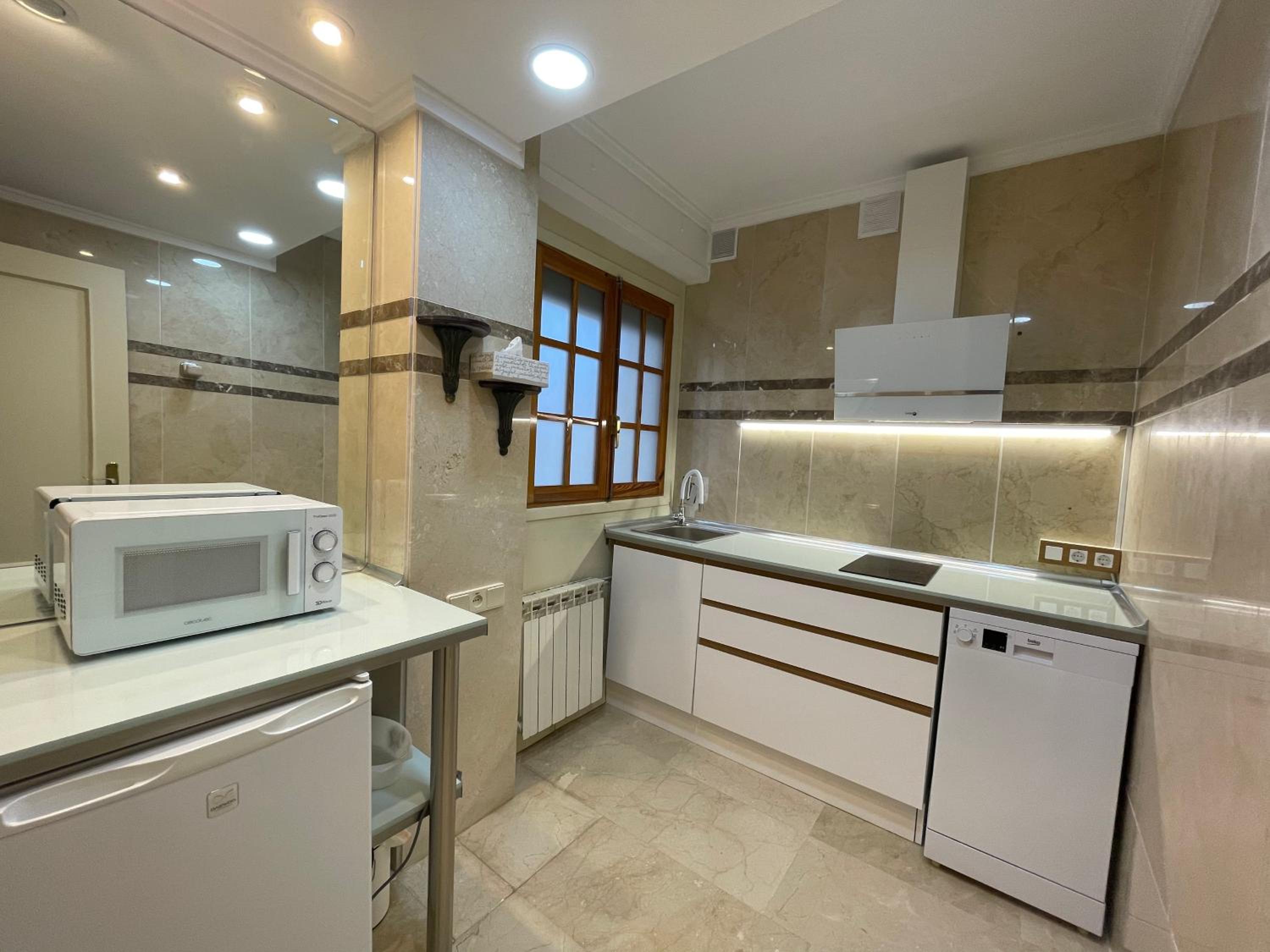 Apartment with Balcony - Photo 2