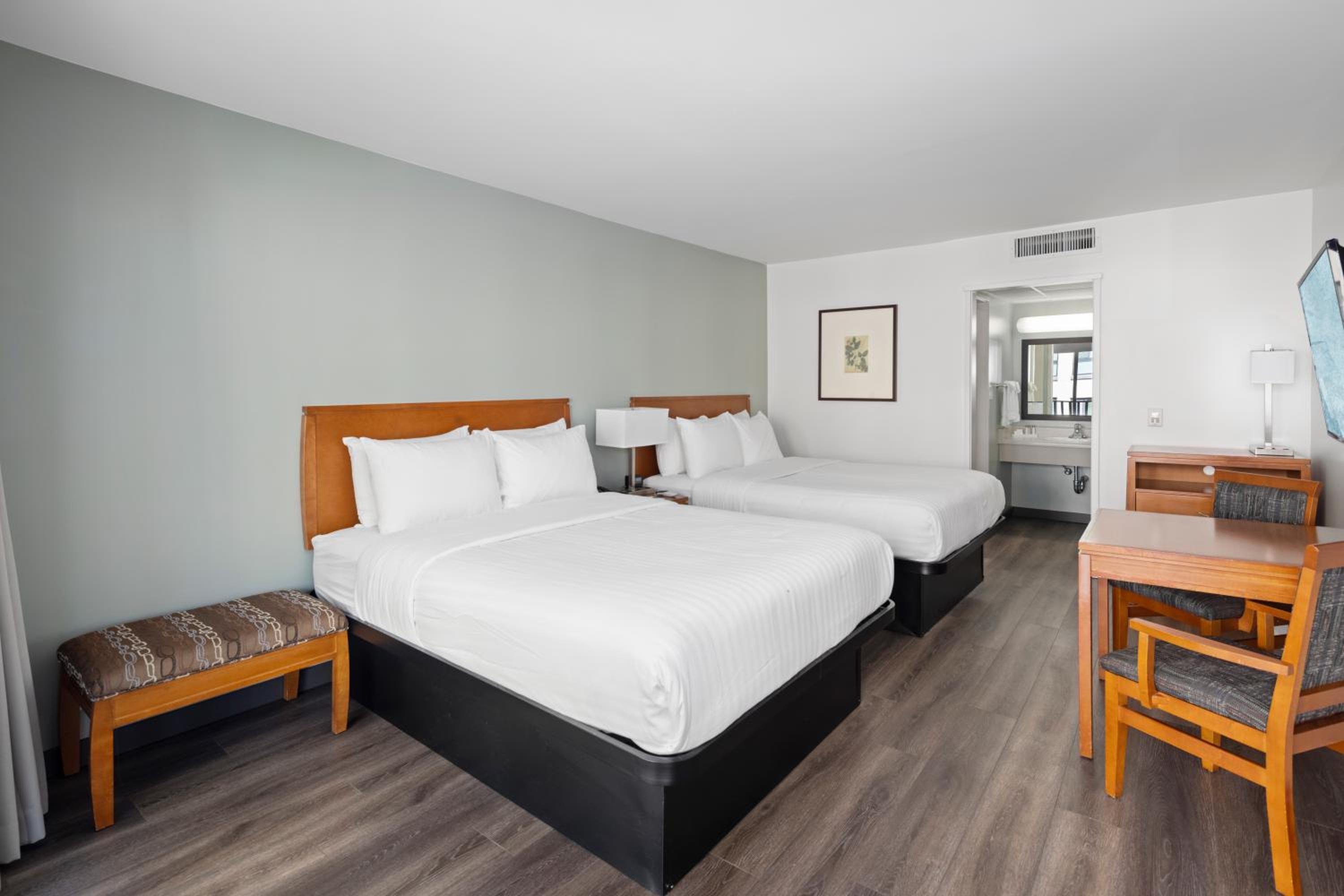 Queen Room with Two Queen Beds - Photo 2