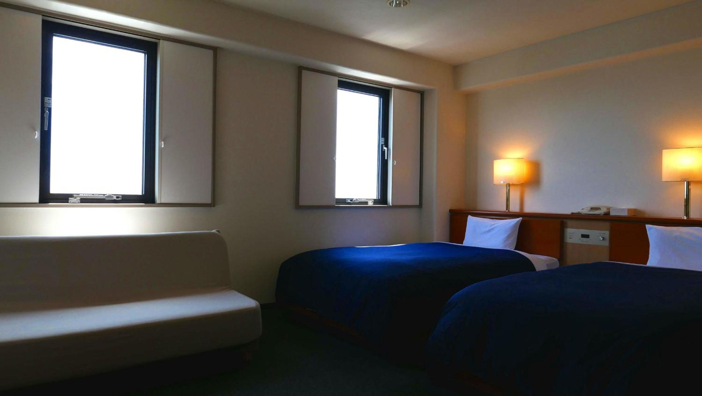 Twin Room - Photo 1
