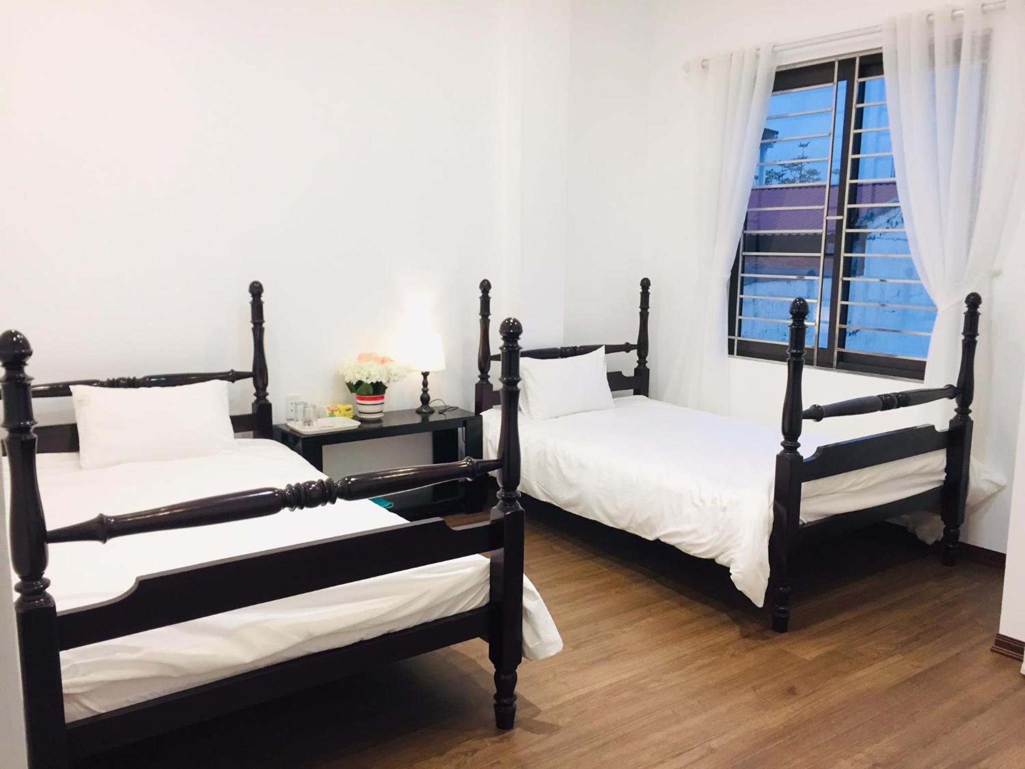 Twin Room with Private Bathroom - Photo 1