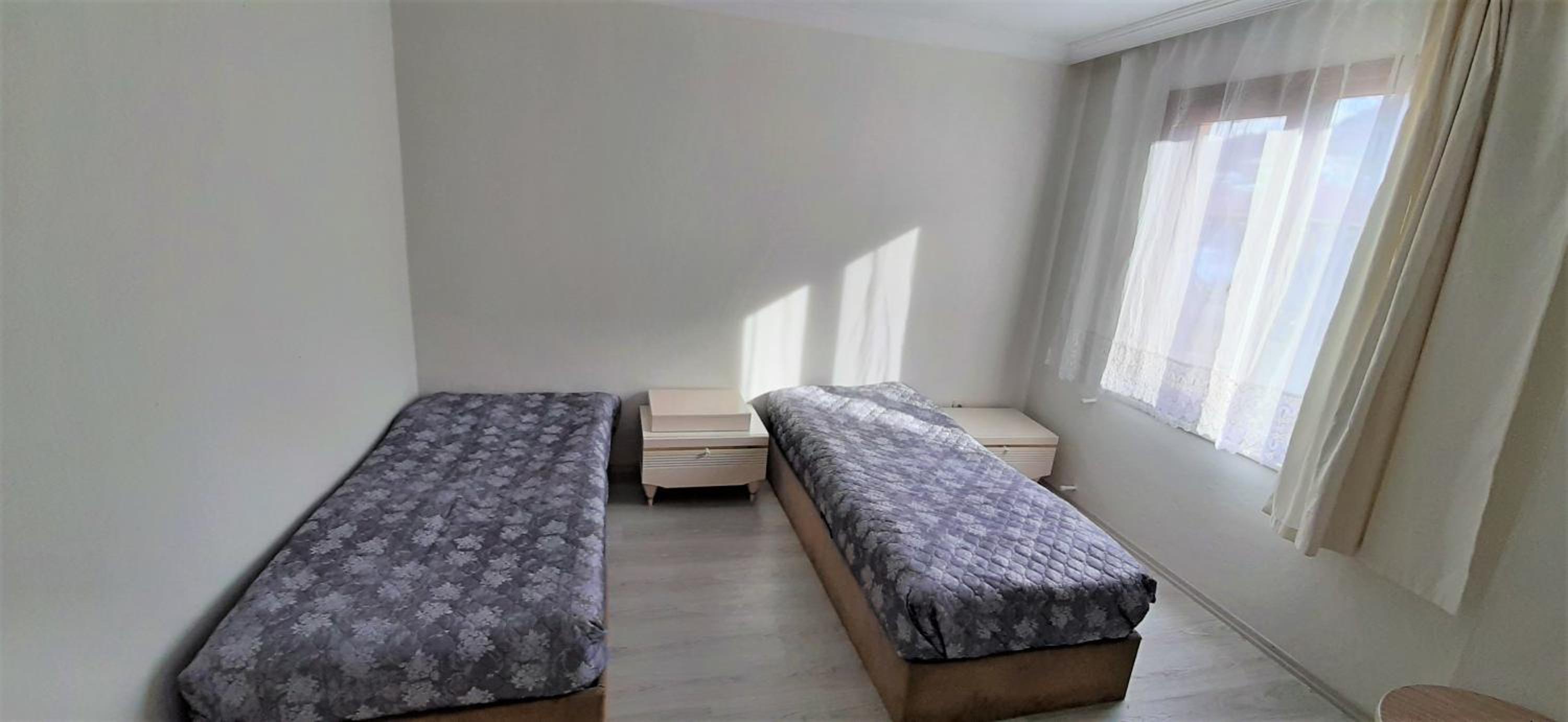Three-Bedroom Apartment - Photo 15
