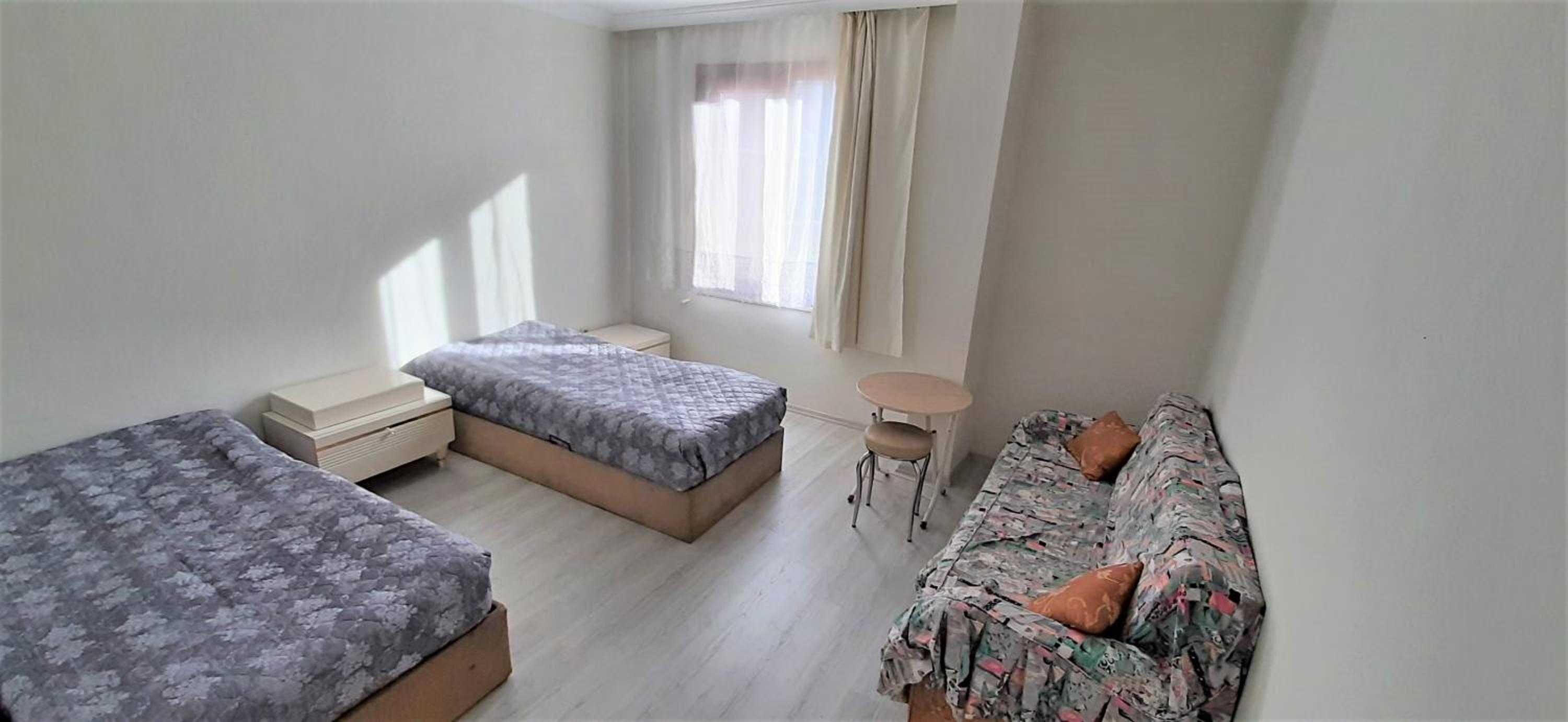 Three-Bedroom Apartment - Photo 16