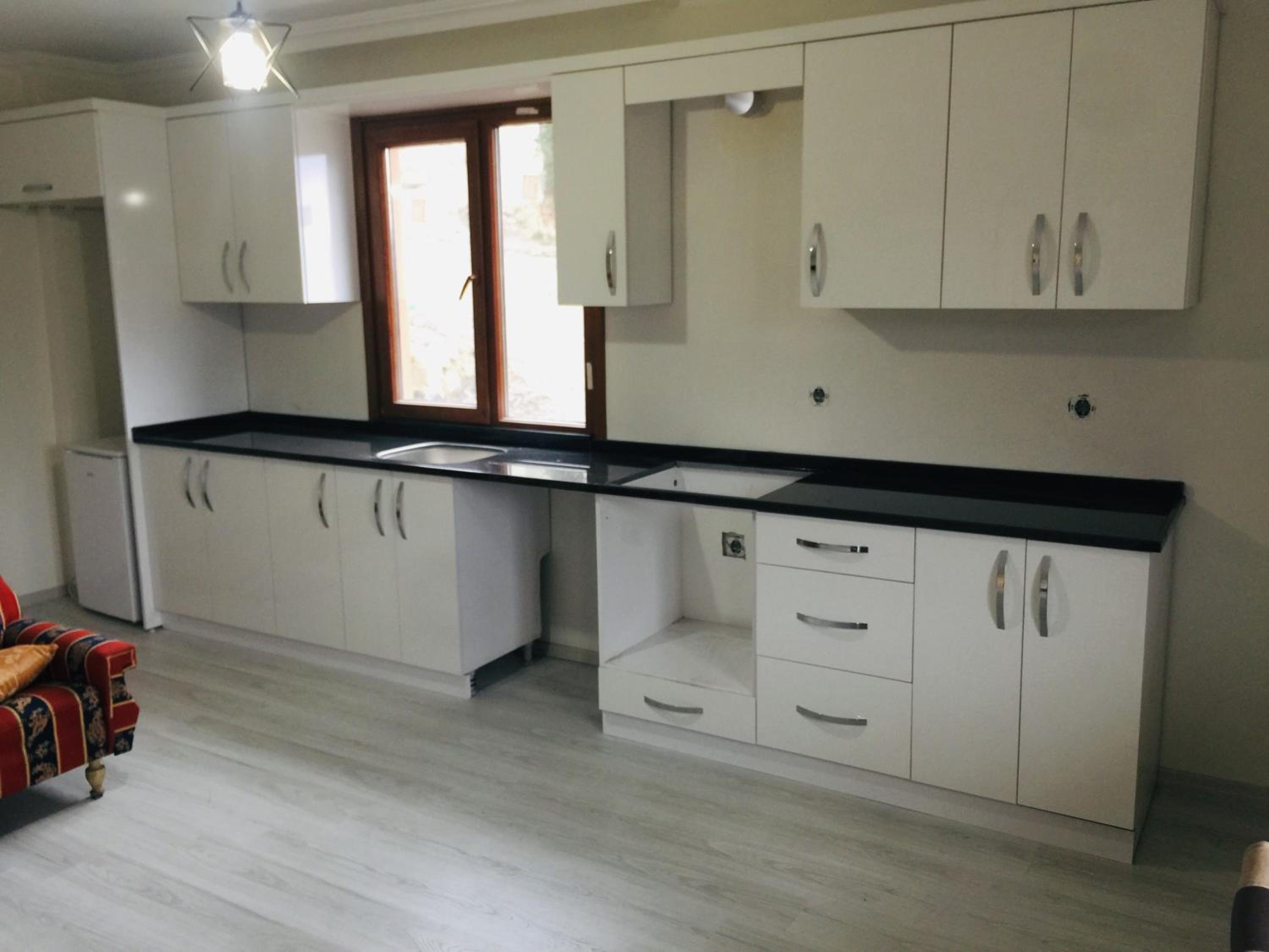 Three-Bedroom Apartment - Photo 11