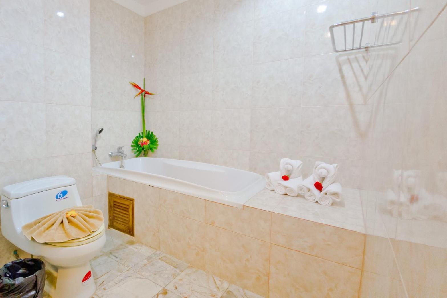 Deluxe Double Room - Photo 11