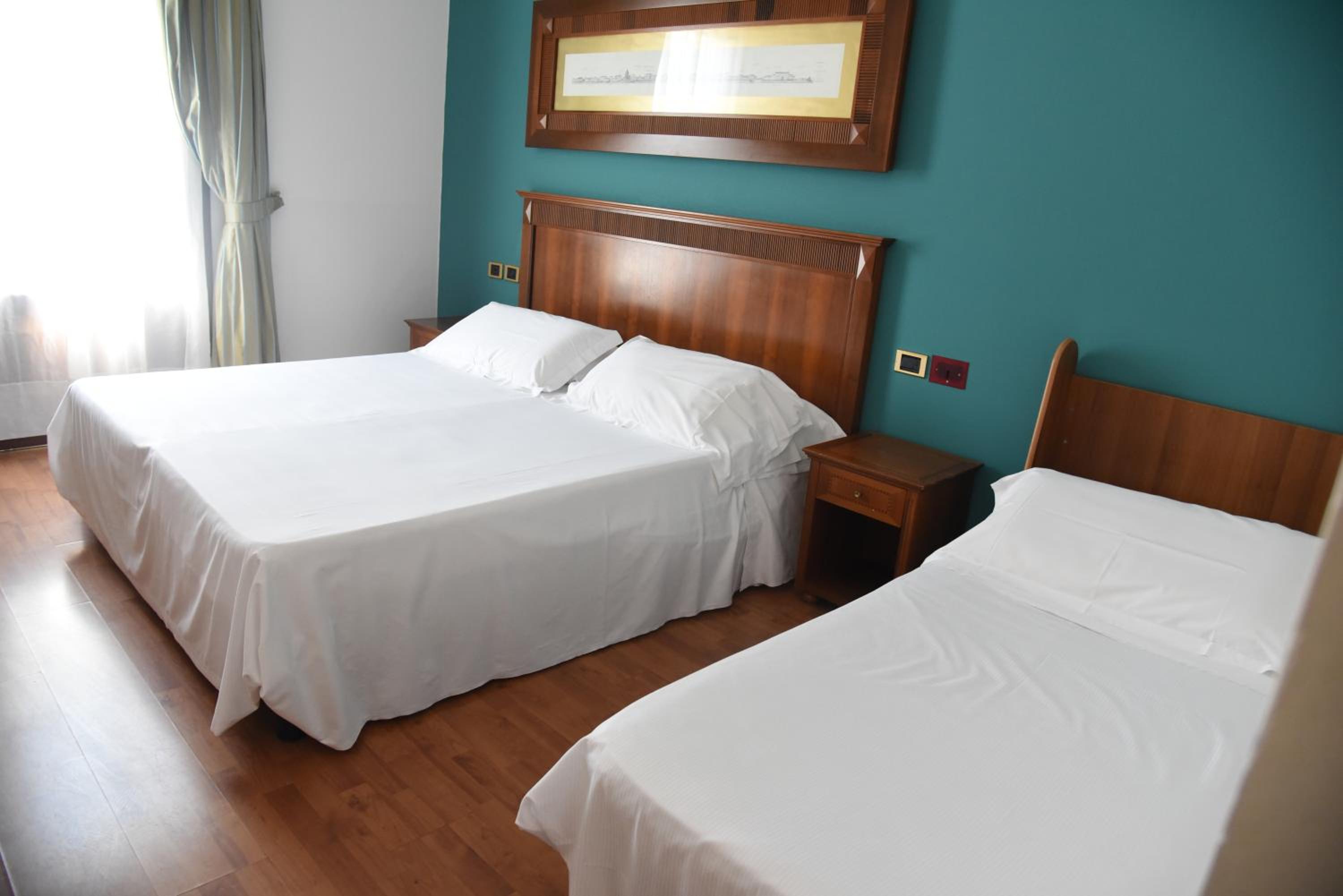 Standard Triple Room - Photo 1