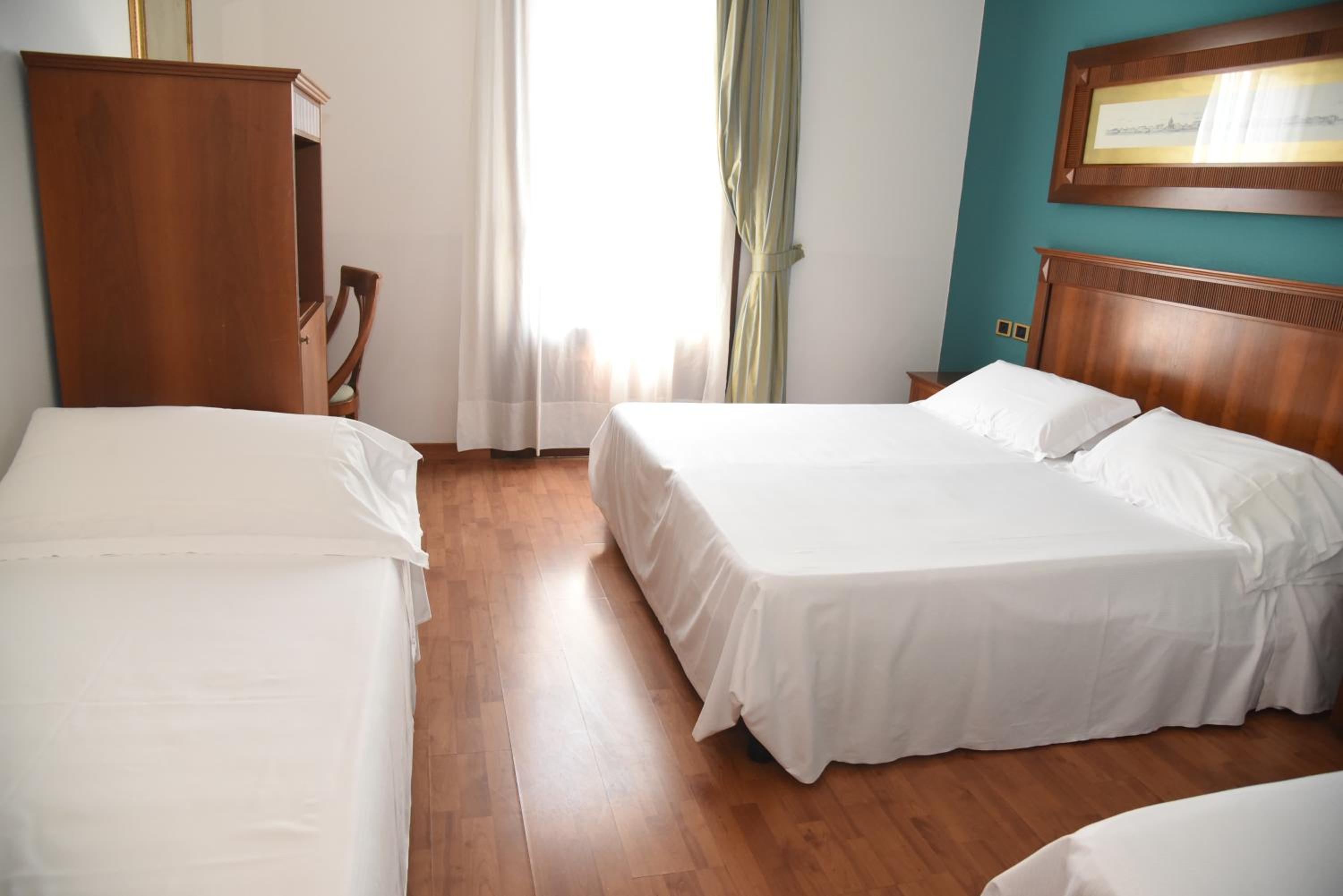 Standard Quadruple Room - Photo 6