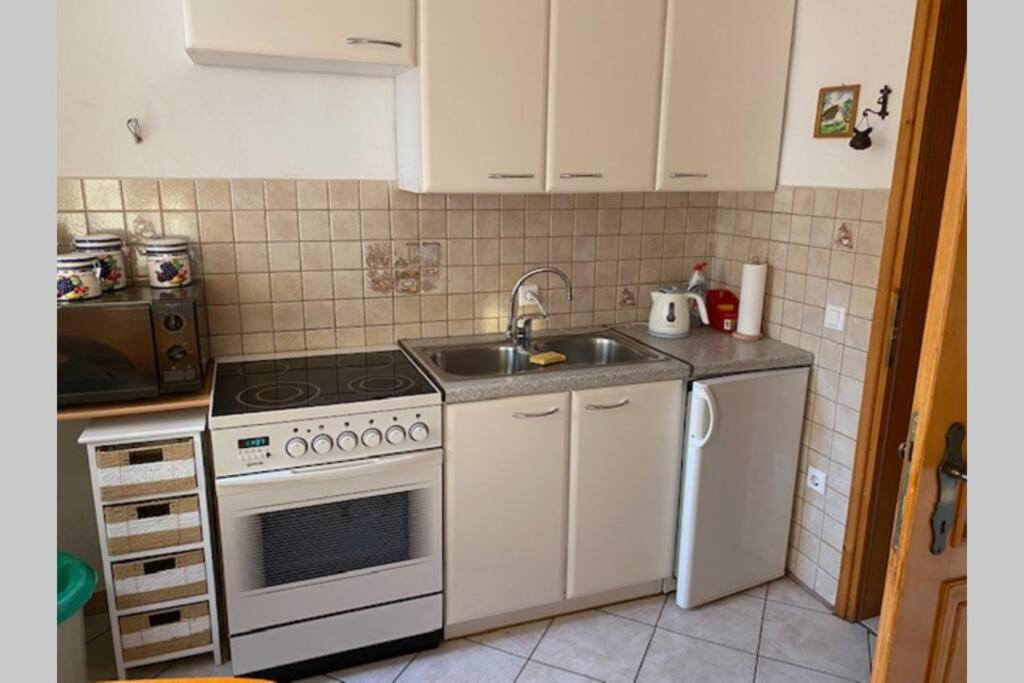 Four-Bedroom Apartment - Photo 40