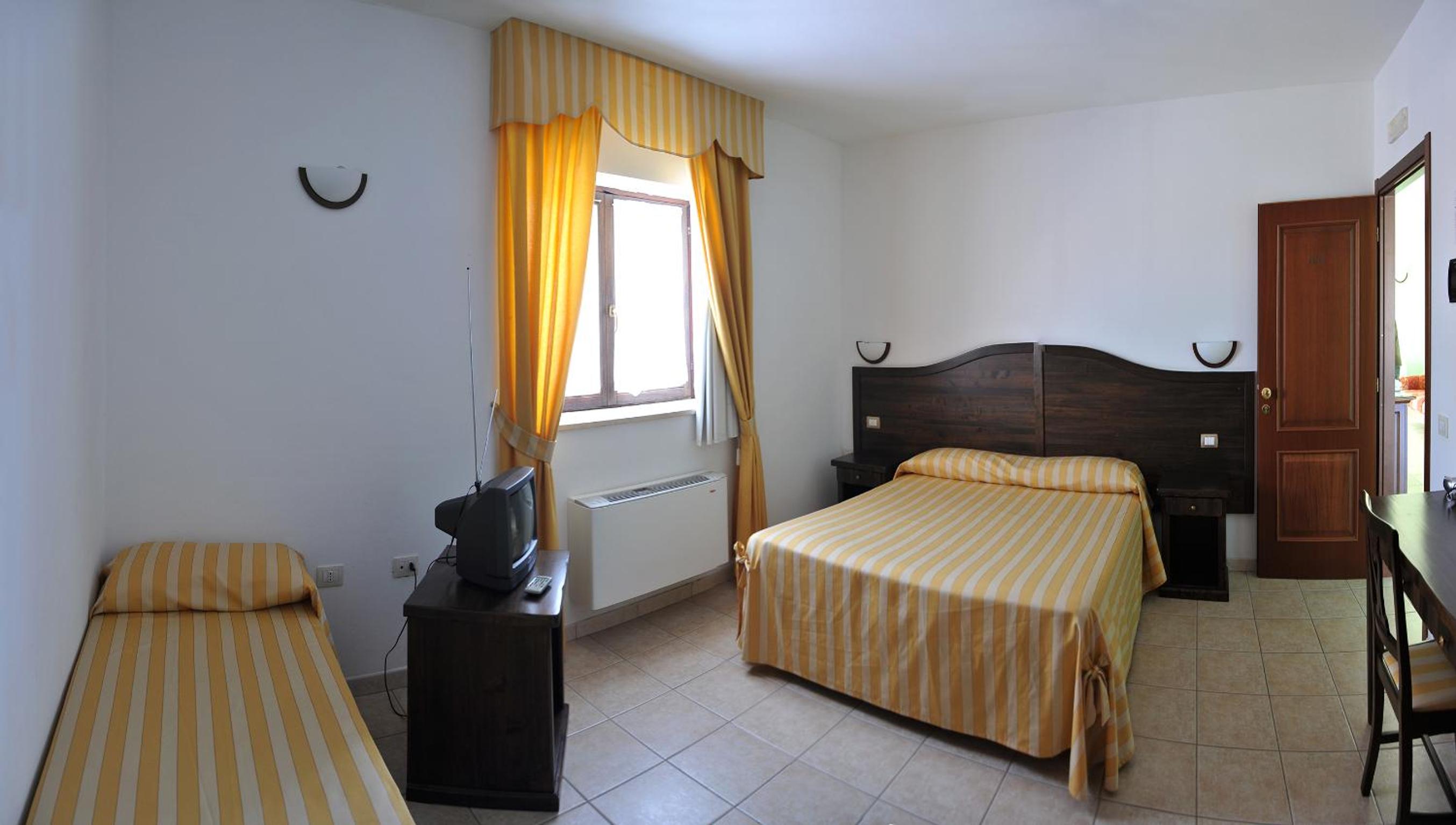 Triple Room (2 Adults + 1 Child) photo 2