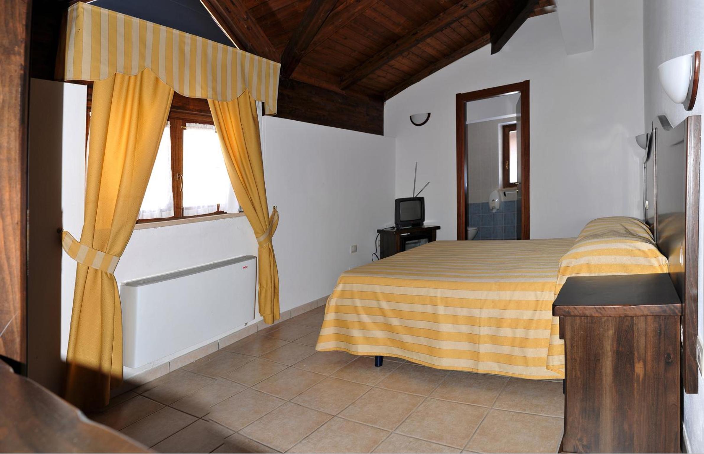 Triple Room (2 Adults + 1 Child)