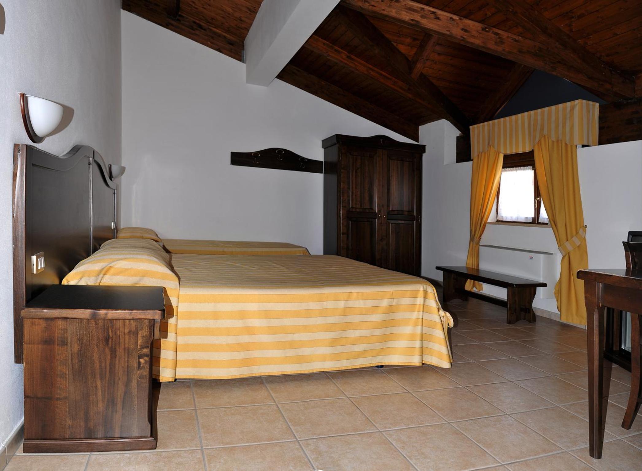 Triple Room (2 Adults + 1 Child) photo 3