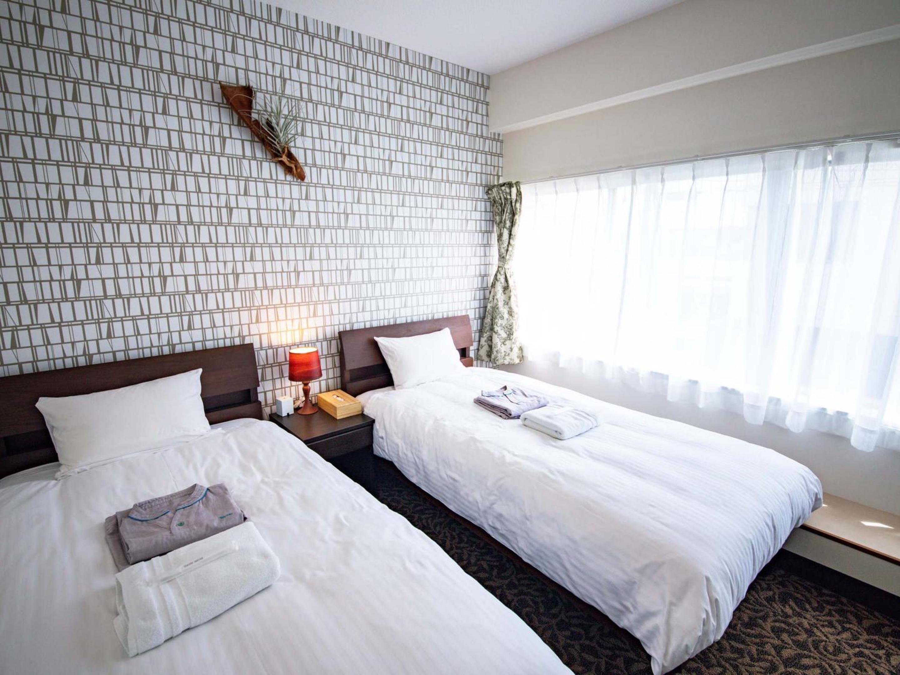 Twin Room - Photo 1