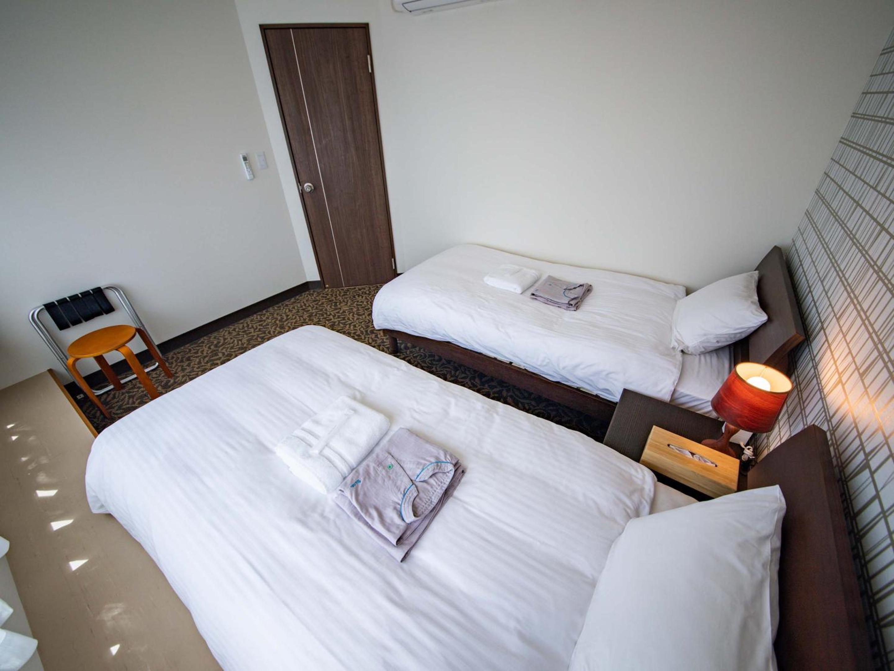 Twin Room - Photo 6