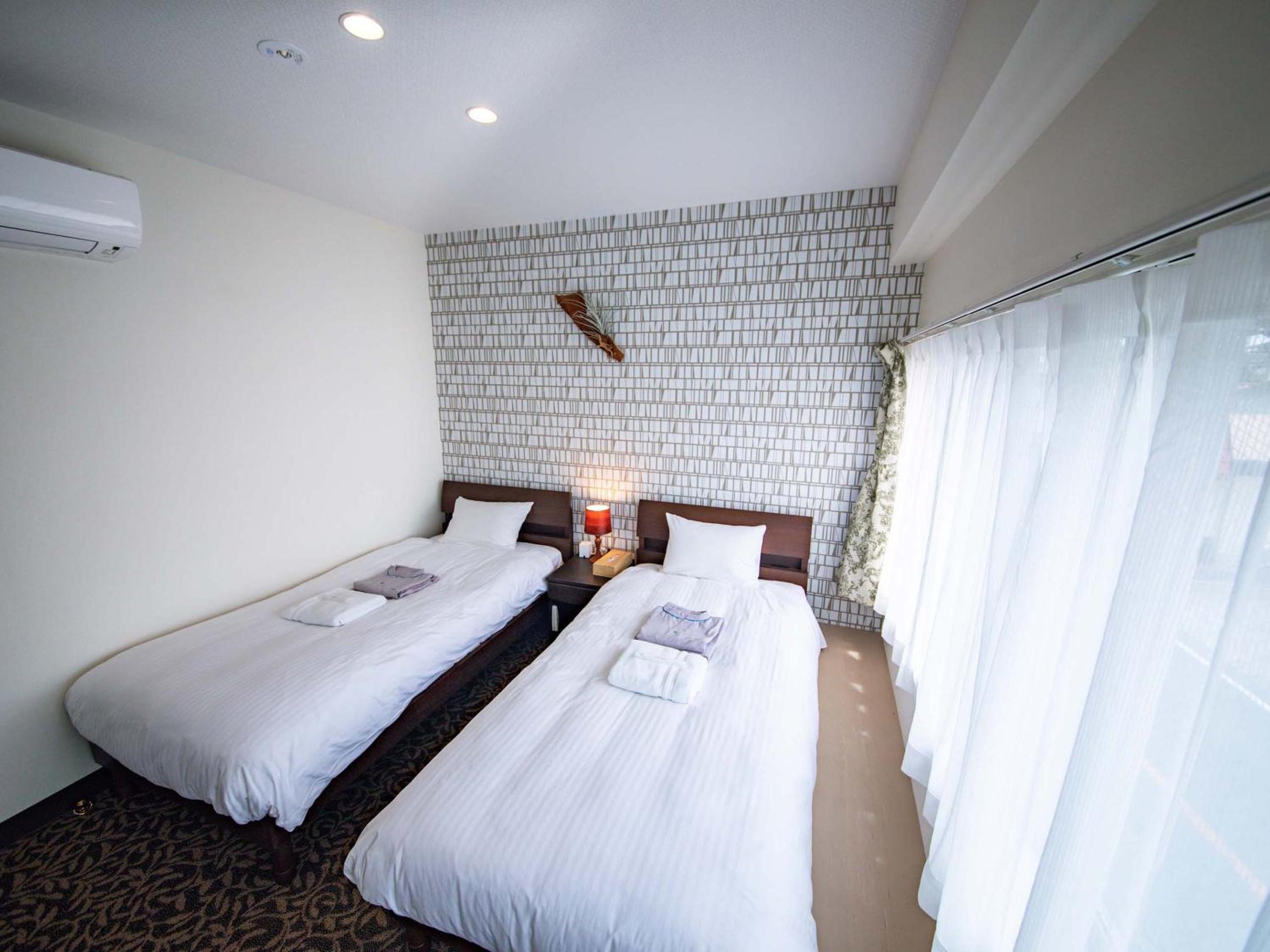 Twin Room - Photo 8