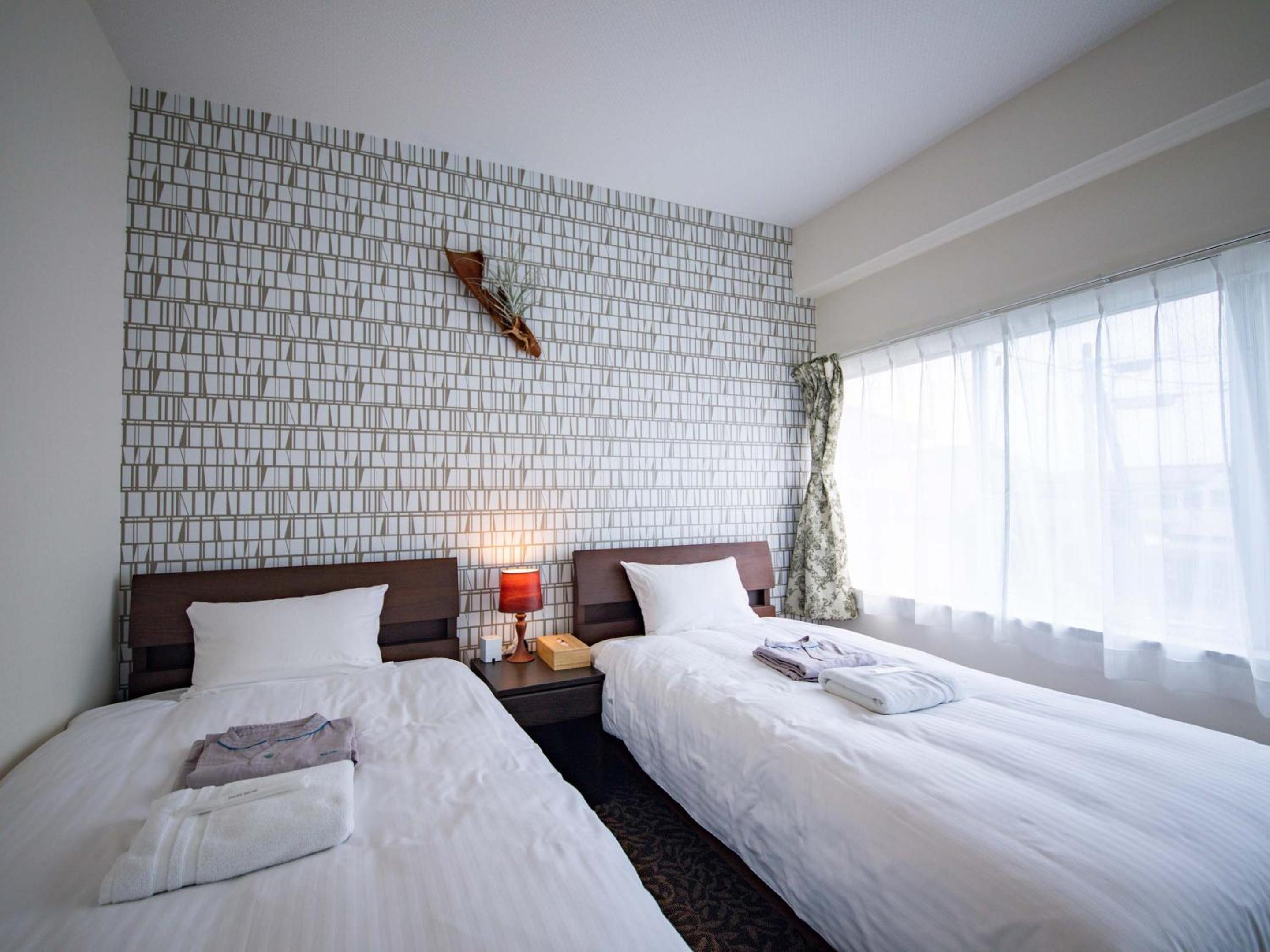 Twin Room - Photo 7