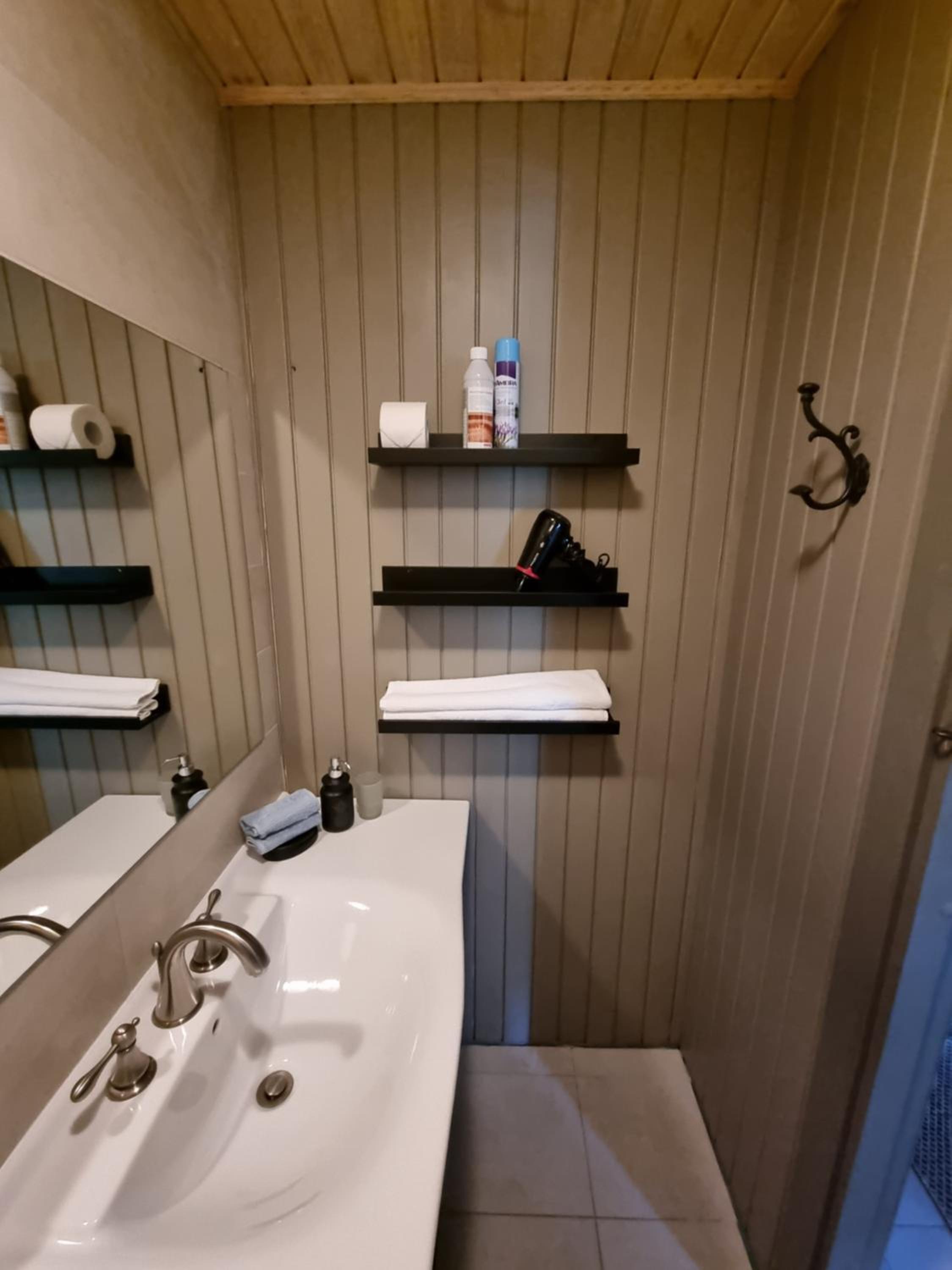 Three-Bedroom House - Photo 18