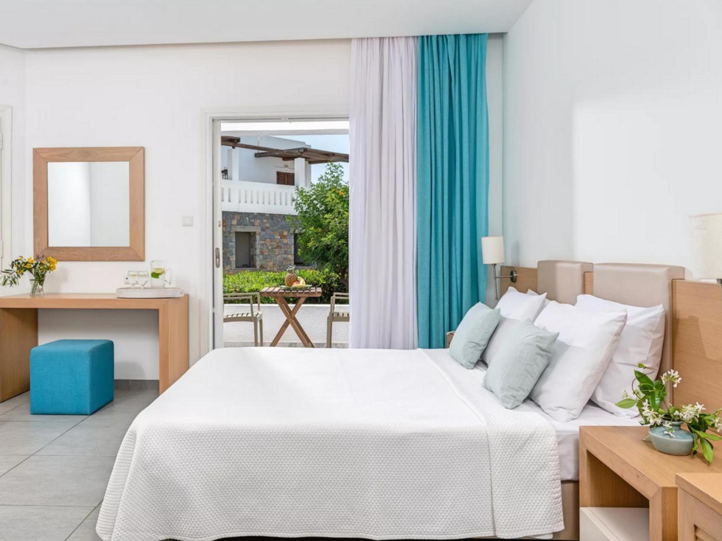 Quadruple Room with Garden View ( 2 Adults & 2 Children)