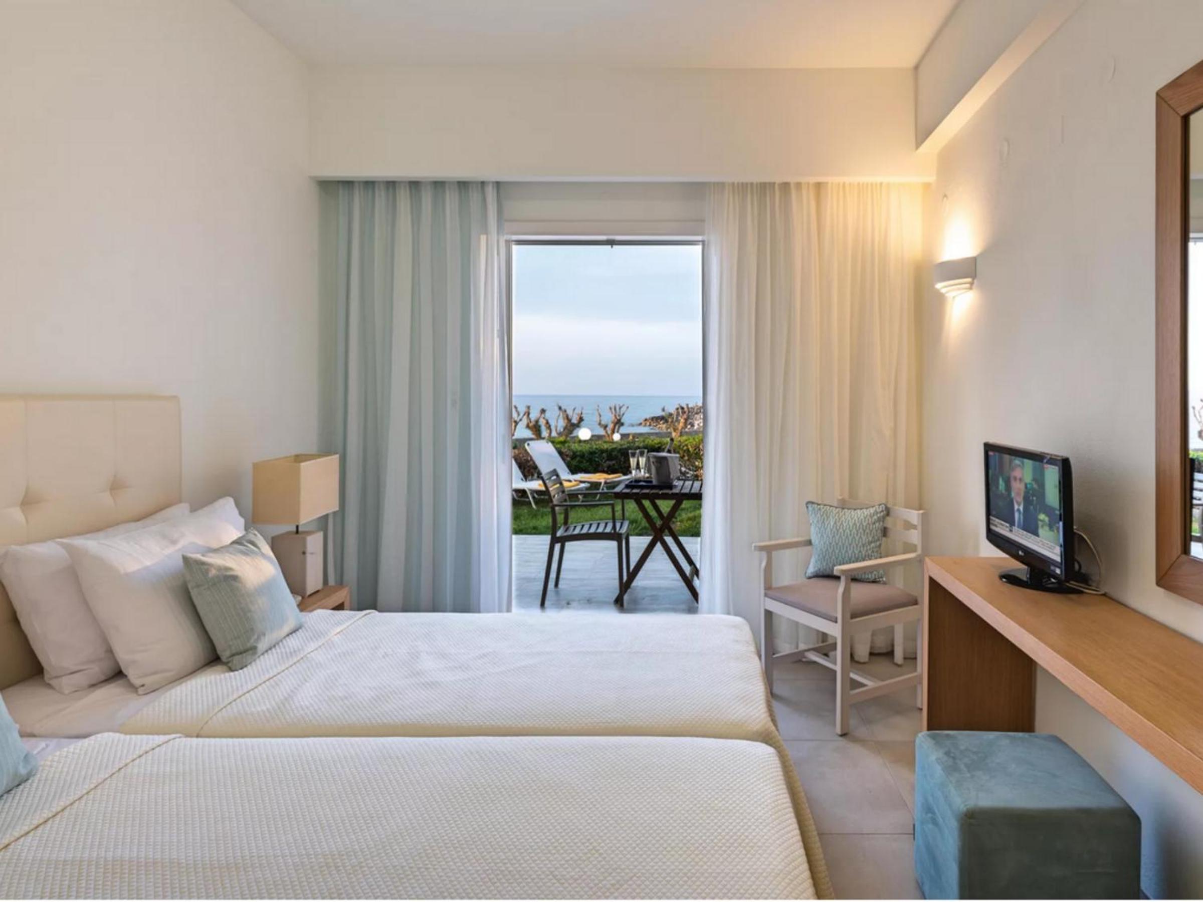 Quadruple Room with Sea View ( 2 Adults & 2 Children)