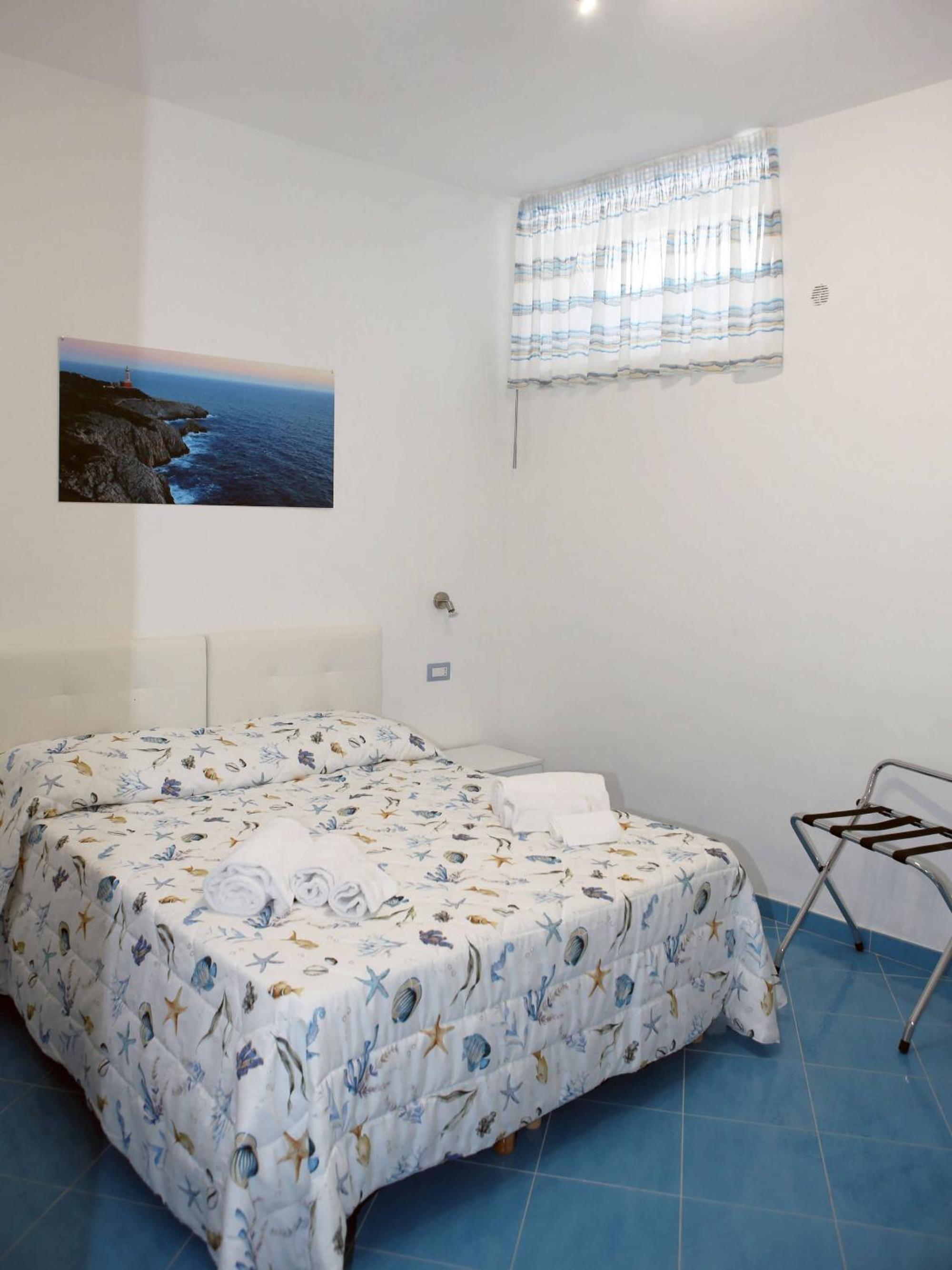 Camera Matrimoniale/Doppia con Letti Singoli con Bagno