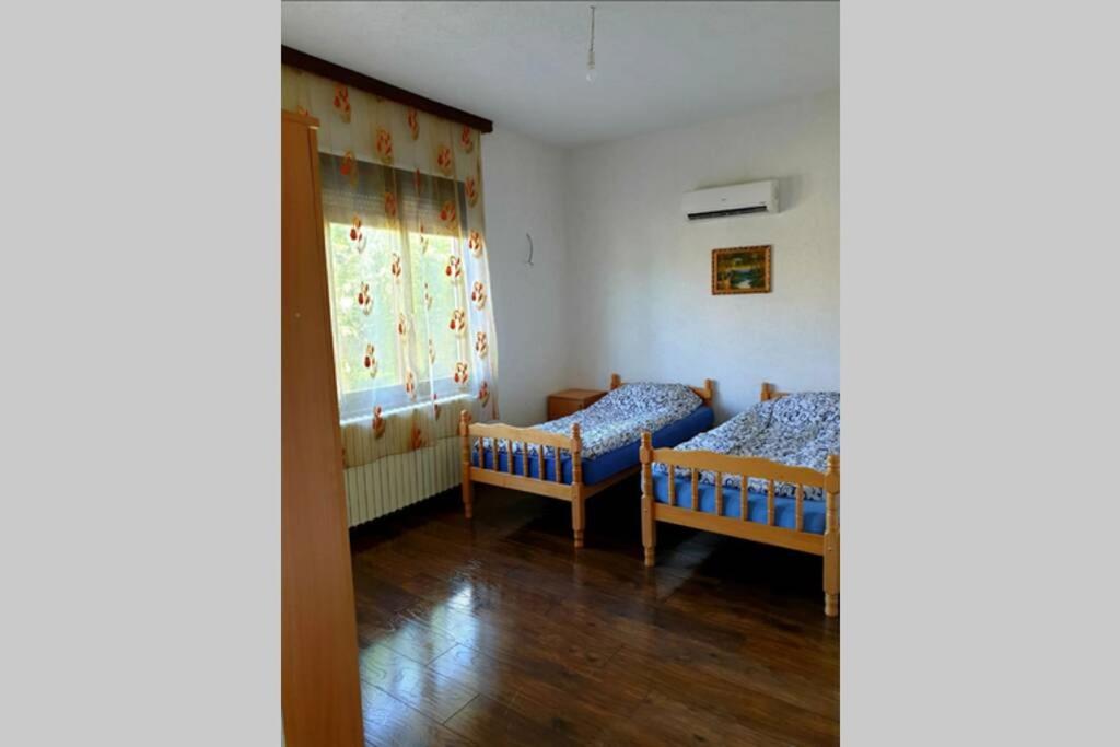 Three-Bedroom House photo 1