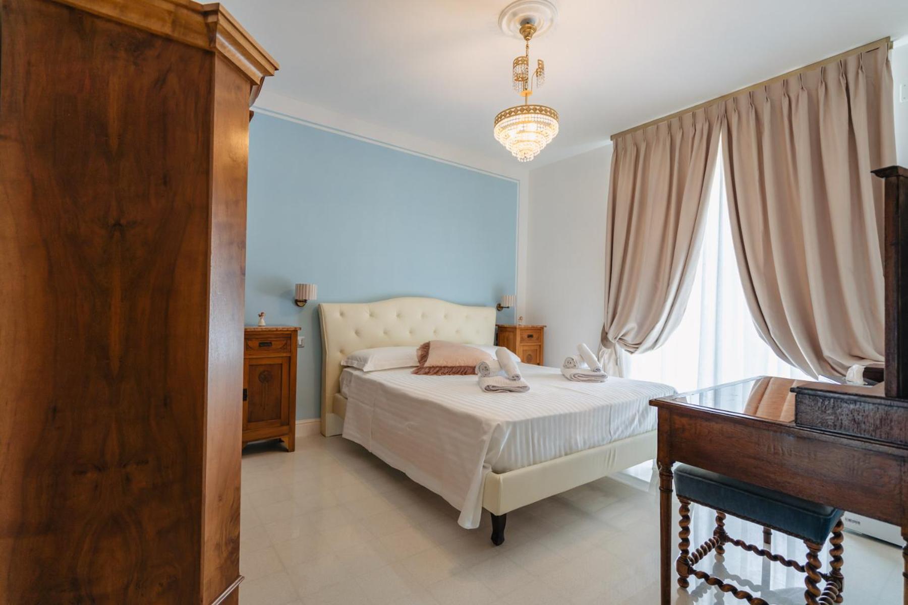 Quadruple Room with Balcony - Photo 2