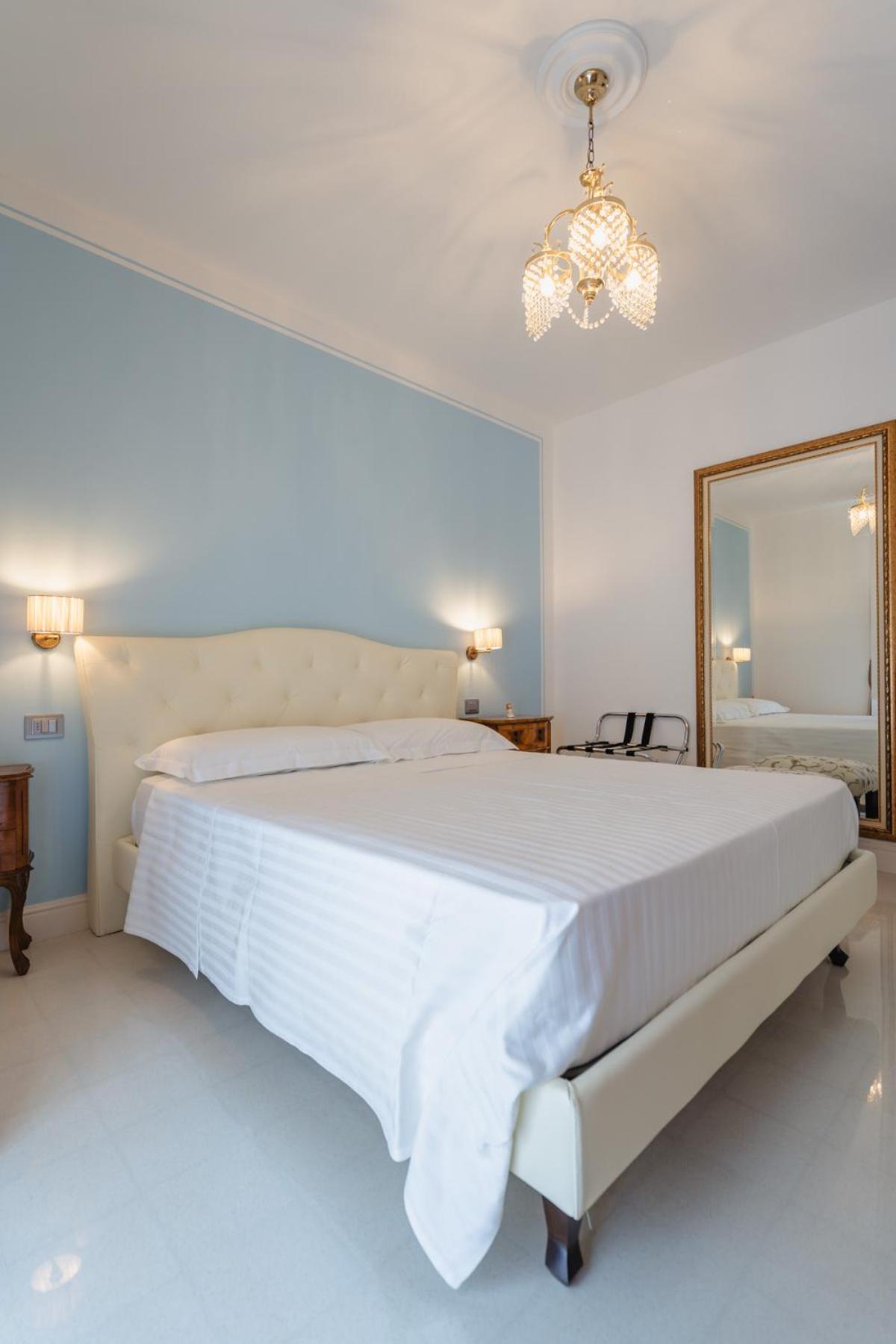 Quadruple Room with Balcony - Photo 1