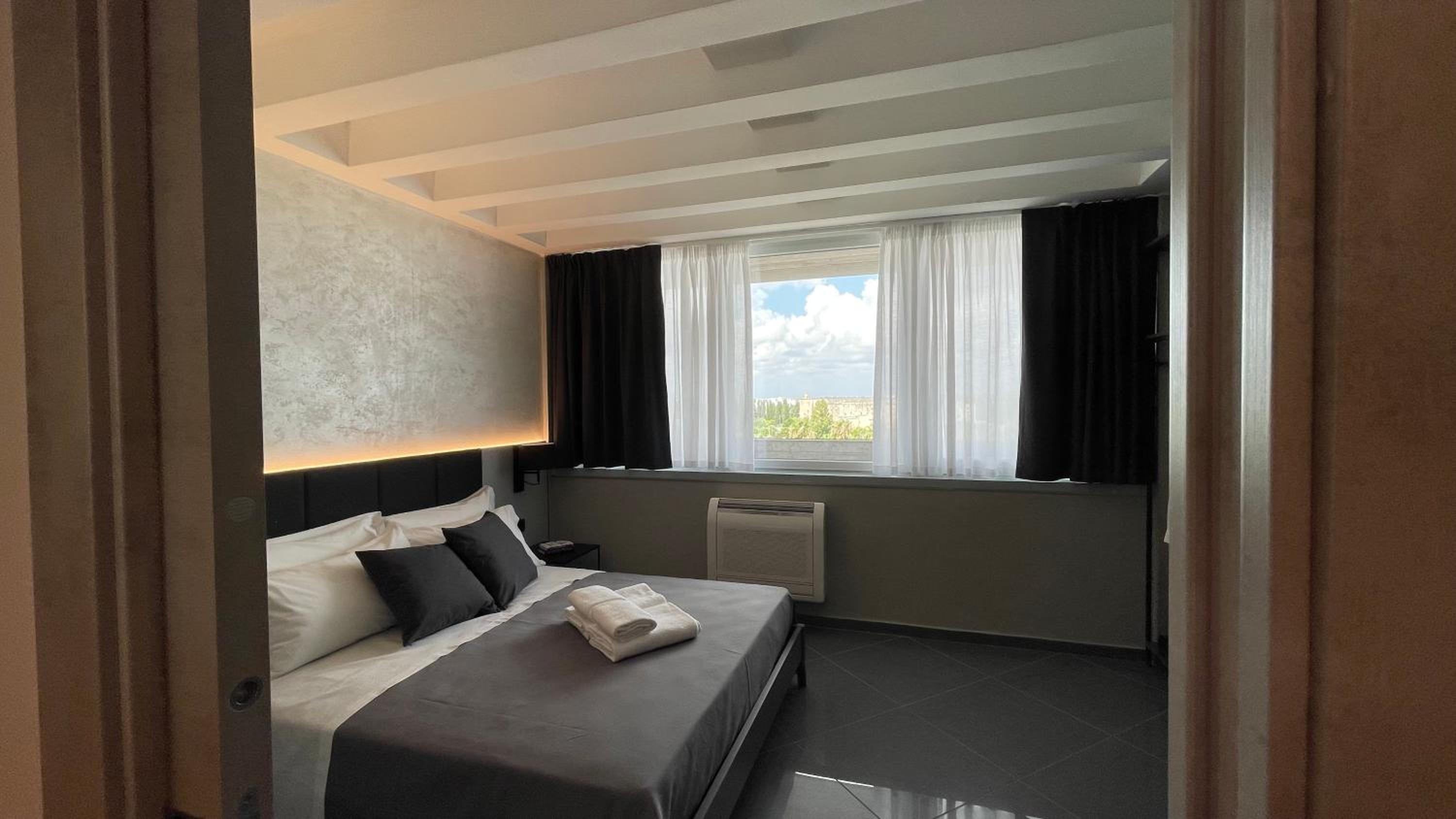 Two Connecting Superior Family Rooms with City View - Disability Access