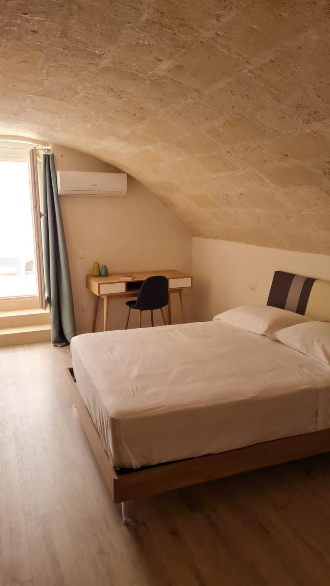 Deluxe Quadruple Room - Photo 11