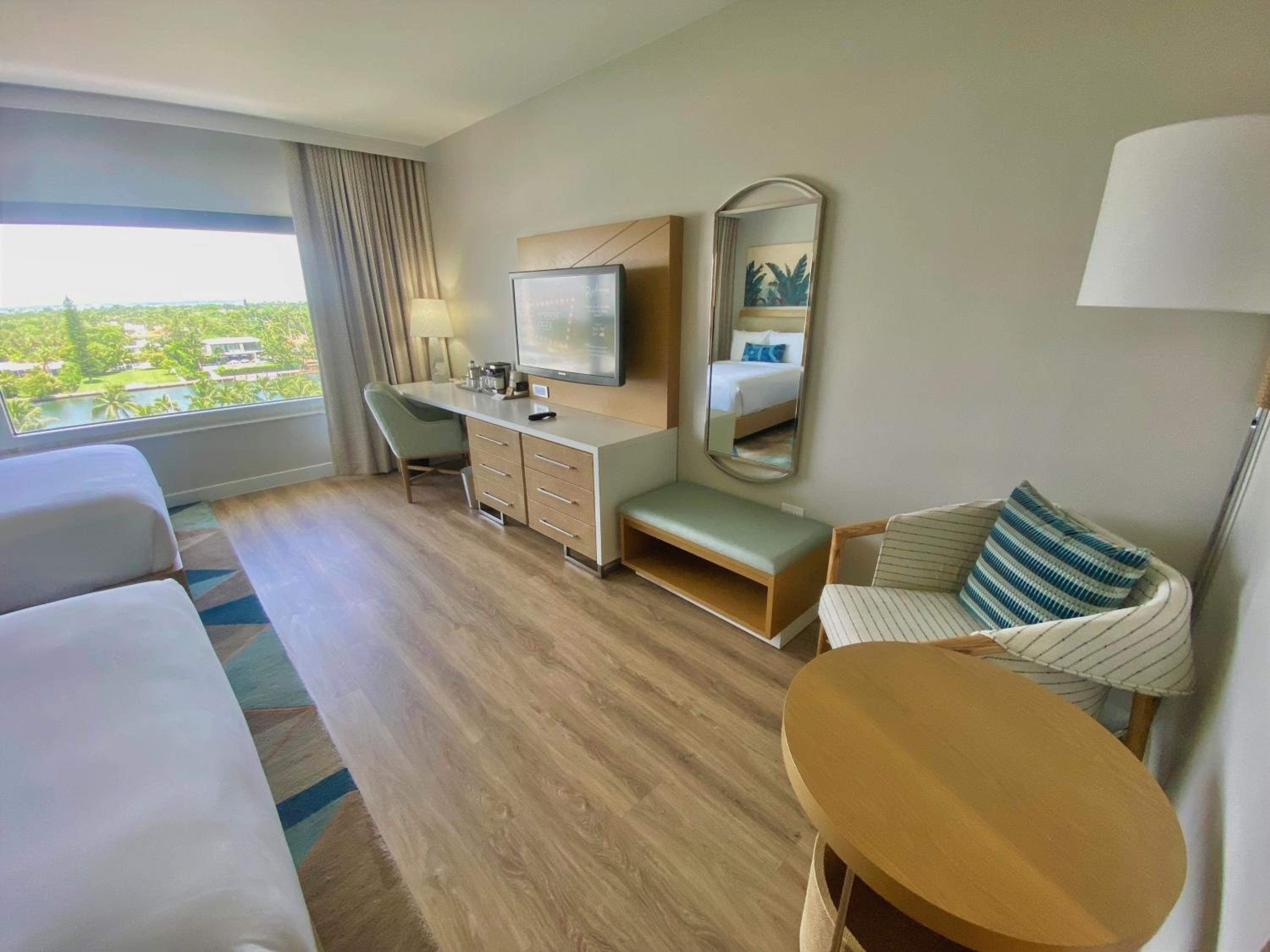 Queen Suite with Two Queen Beds and Sofa Bed - Non Smoking - Photo 1