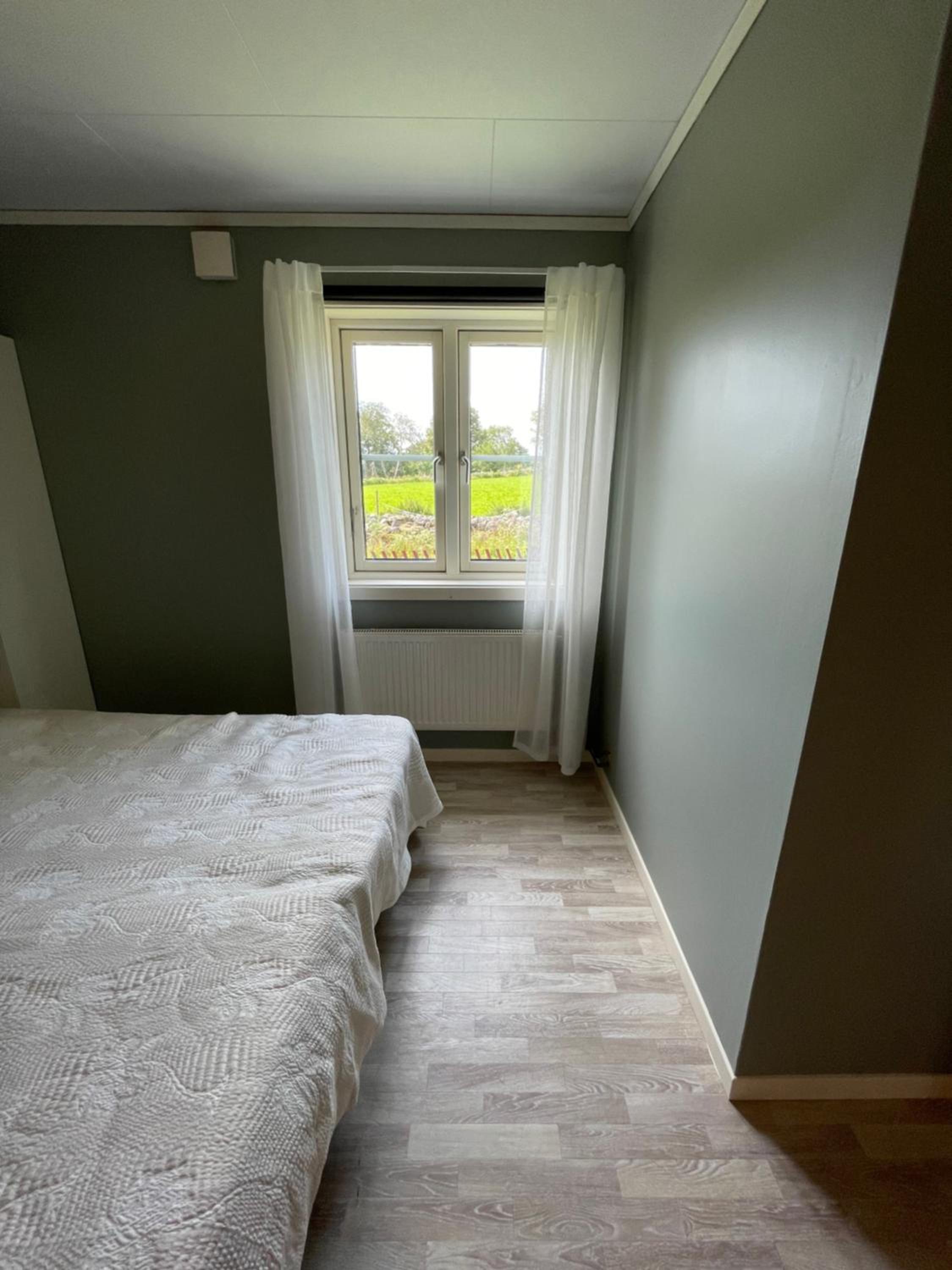 Four-Bedroom House - Photo 26