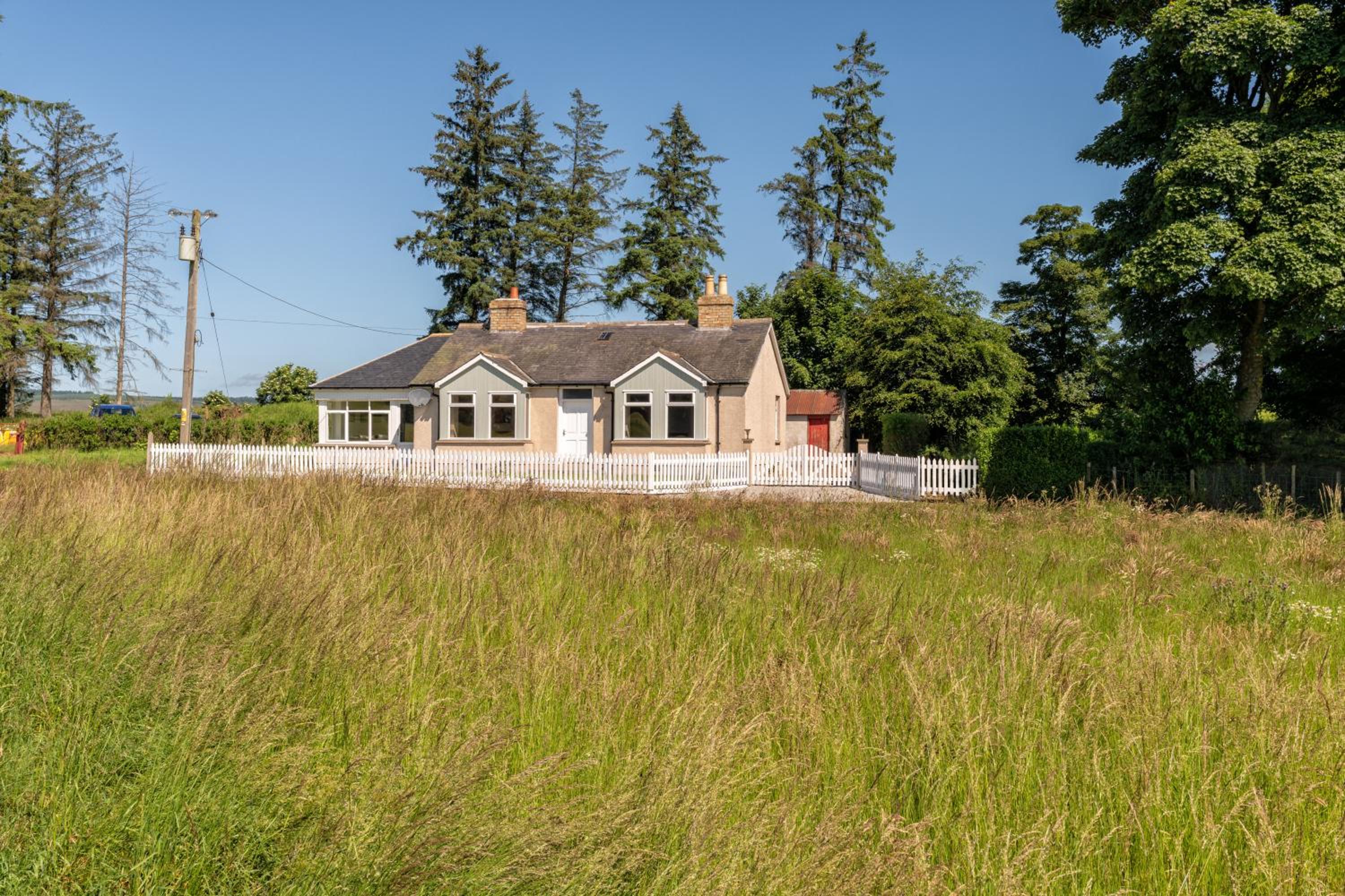 Three-Bedroom House - Photo 26