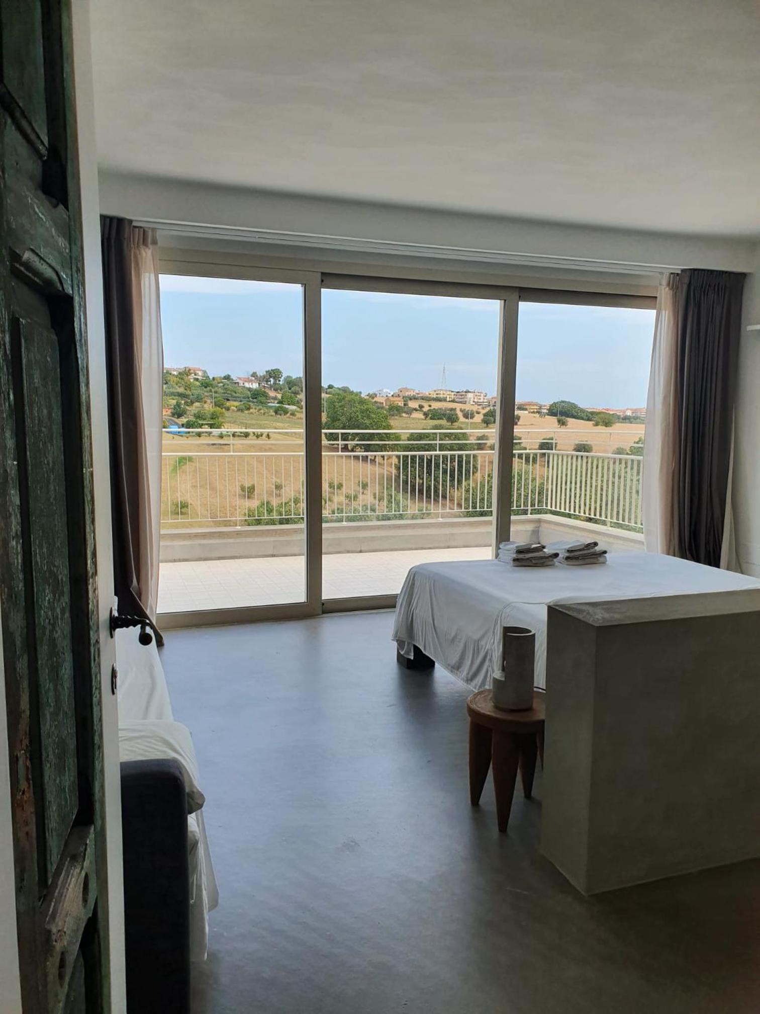Quadruple Room with Private Bathroom photo 1
