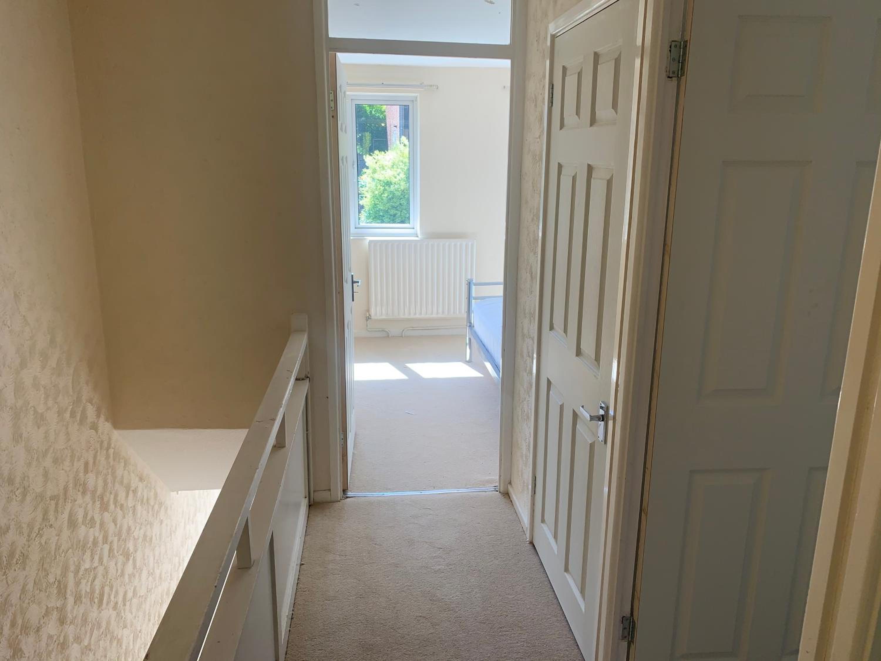 Three-Bedroom House - Photo 12