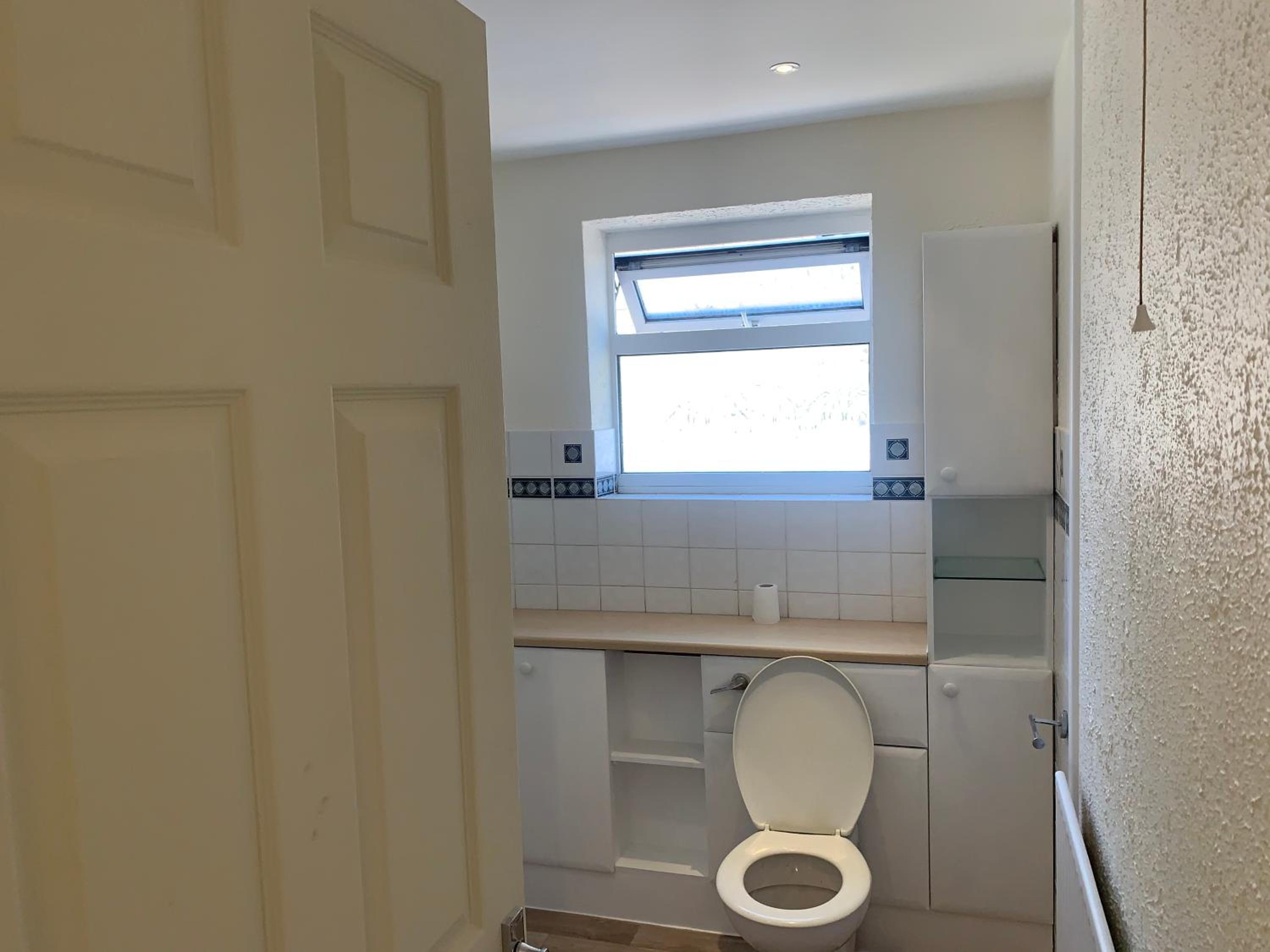 Three-Bedroom House - Photo 13